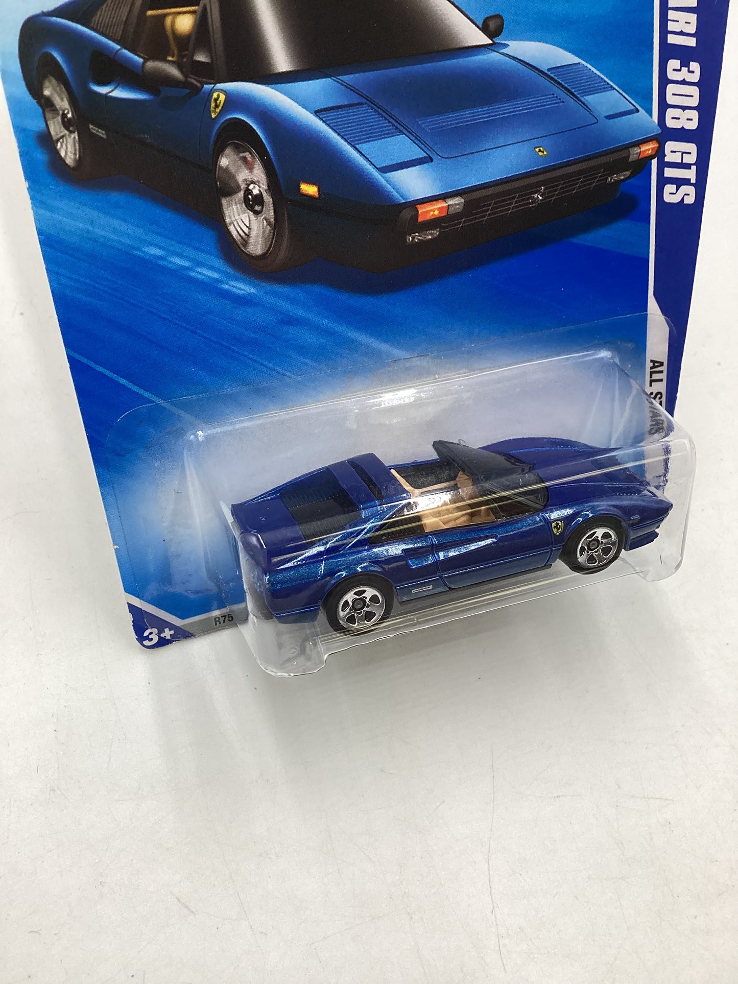 2010 Hot Wheels #128 Blue Ferrari 308 GTS with protector