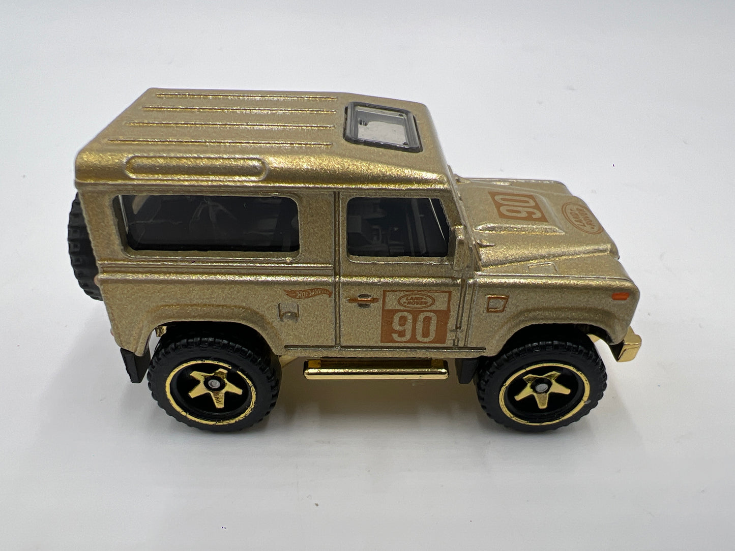 2022 Hot Wheels FAO Schwarz Loose Land Rover Defender 90 Gold