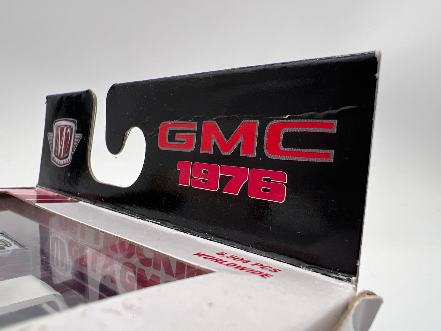 M2 Machines OReillys Exclusive 1976 GMC Sierra Grande 15 White/Pink W/Protector Bad Box S123