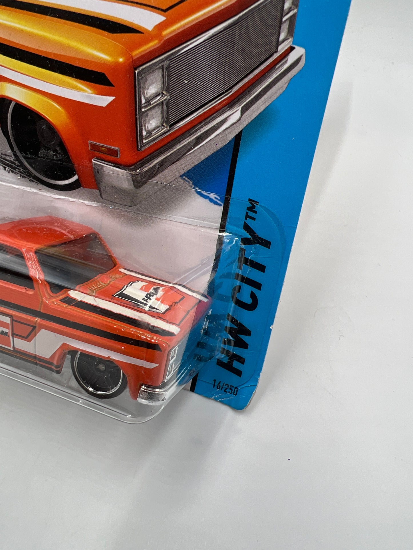 2015 Hot Wheels City #16 83 Chevy Silverado Fram Orange W/Protector 1