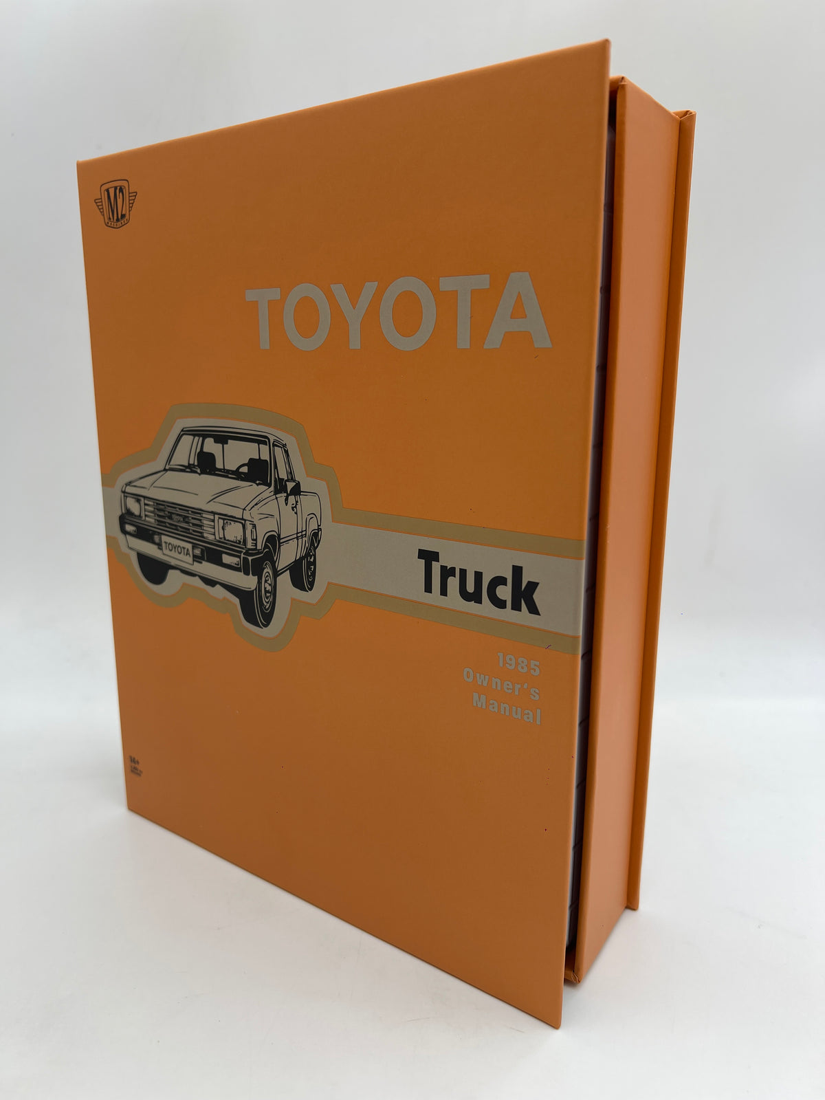 2026 M2 Machines 1/64 Shadow Box 1985 Toyota Truck Black
