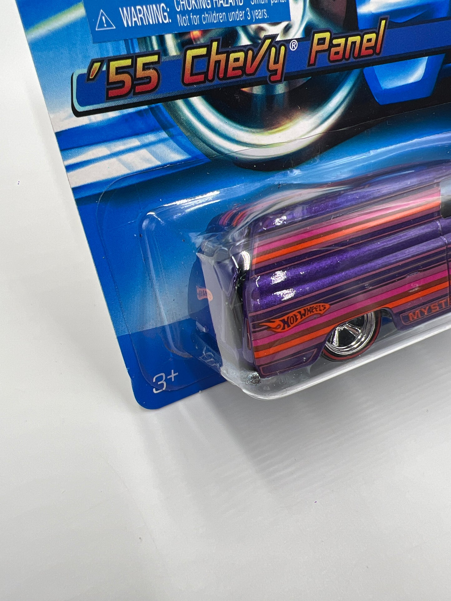 2006 Hot Wheels Mystery Car #222 55 Chevy Panel Real Riders W/Protector Cracked Blister