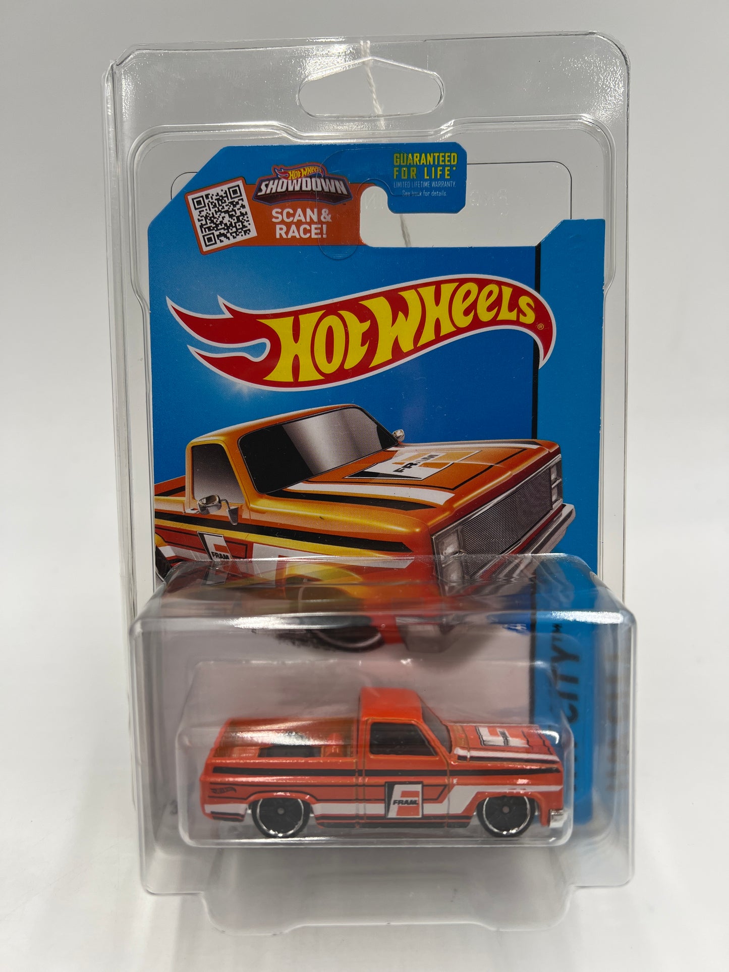 2015 Hot Wheels City #16 83 Chevy Silverado Fram Orange W/Protector Bad Card