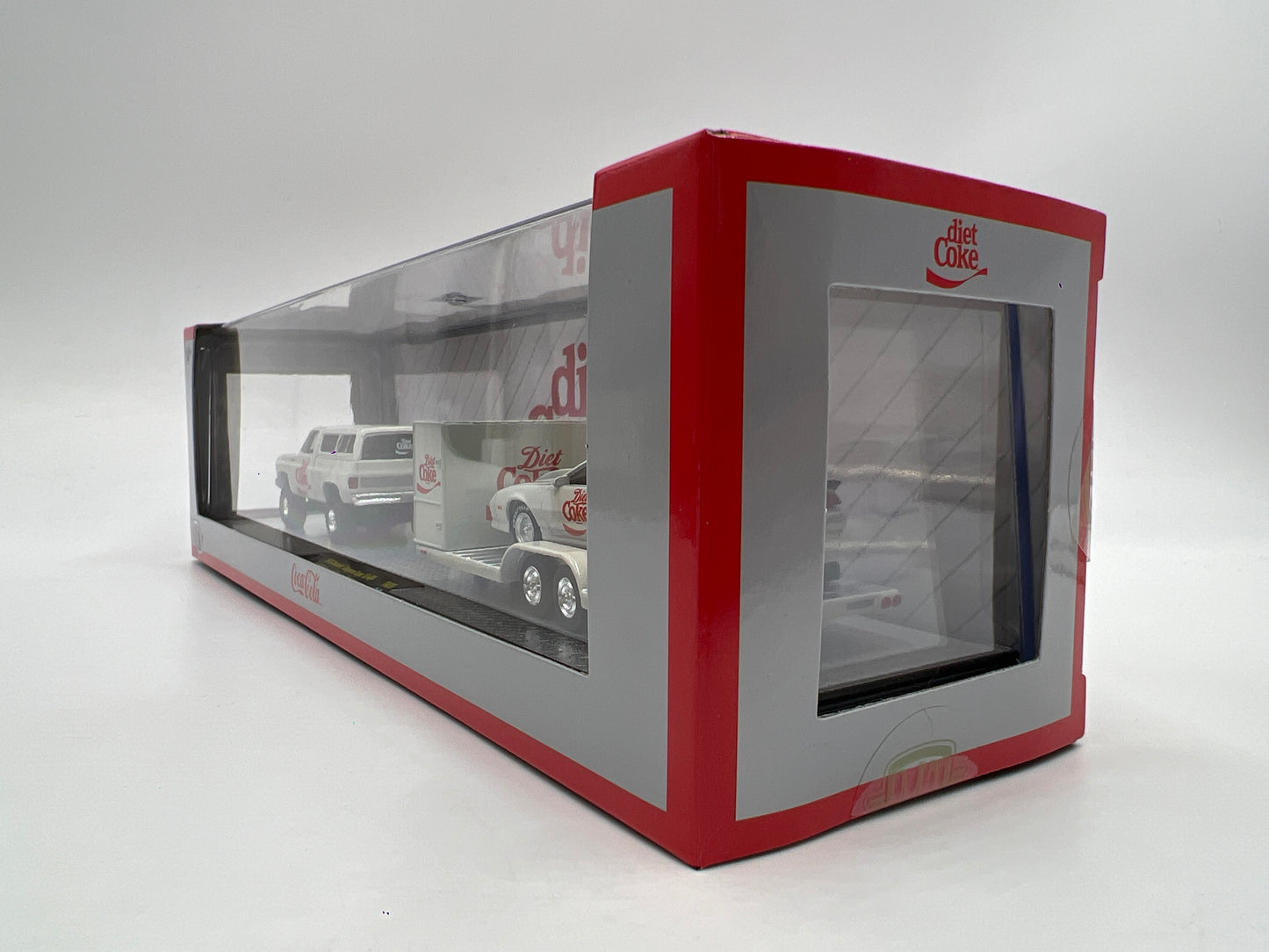 2025 M2 Machines Auto Haulers Diet Coke 1973 Chevrolet Cheyenne Super 10 4x4 & 1985 Chevrolet Camaro IROC-Z TW39