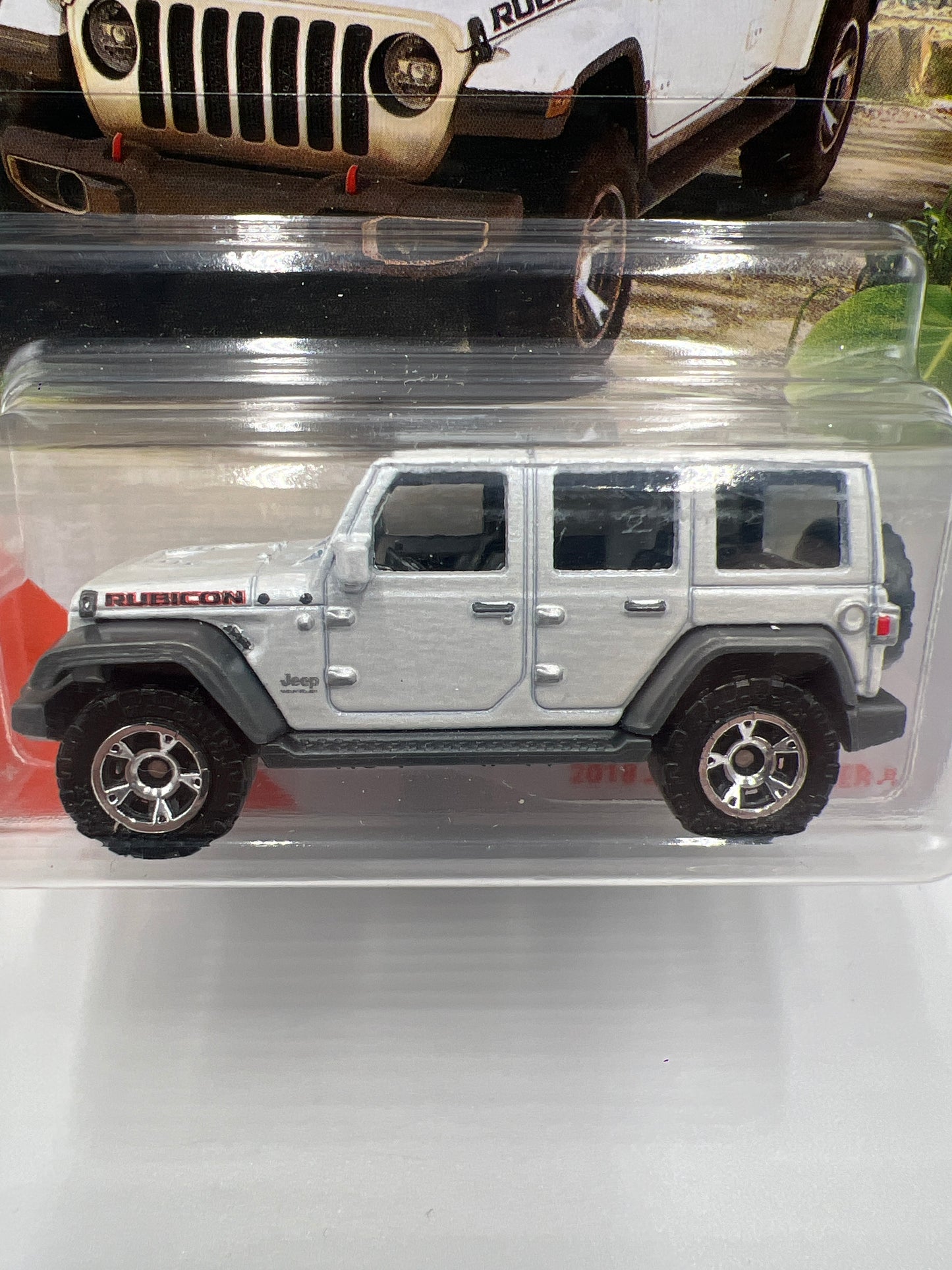 Matchbox MBX Jungle #64 2018 Jeep Wrangler JL White W/Protector
