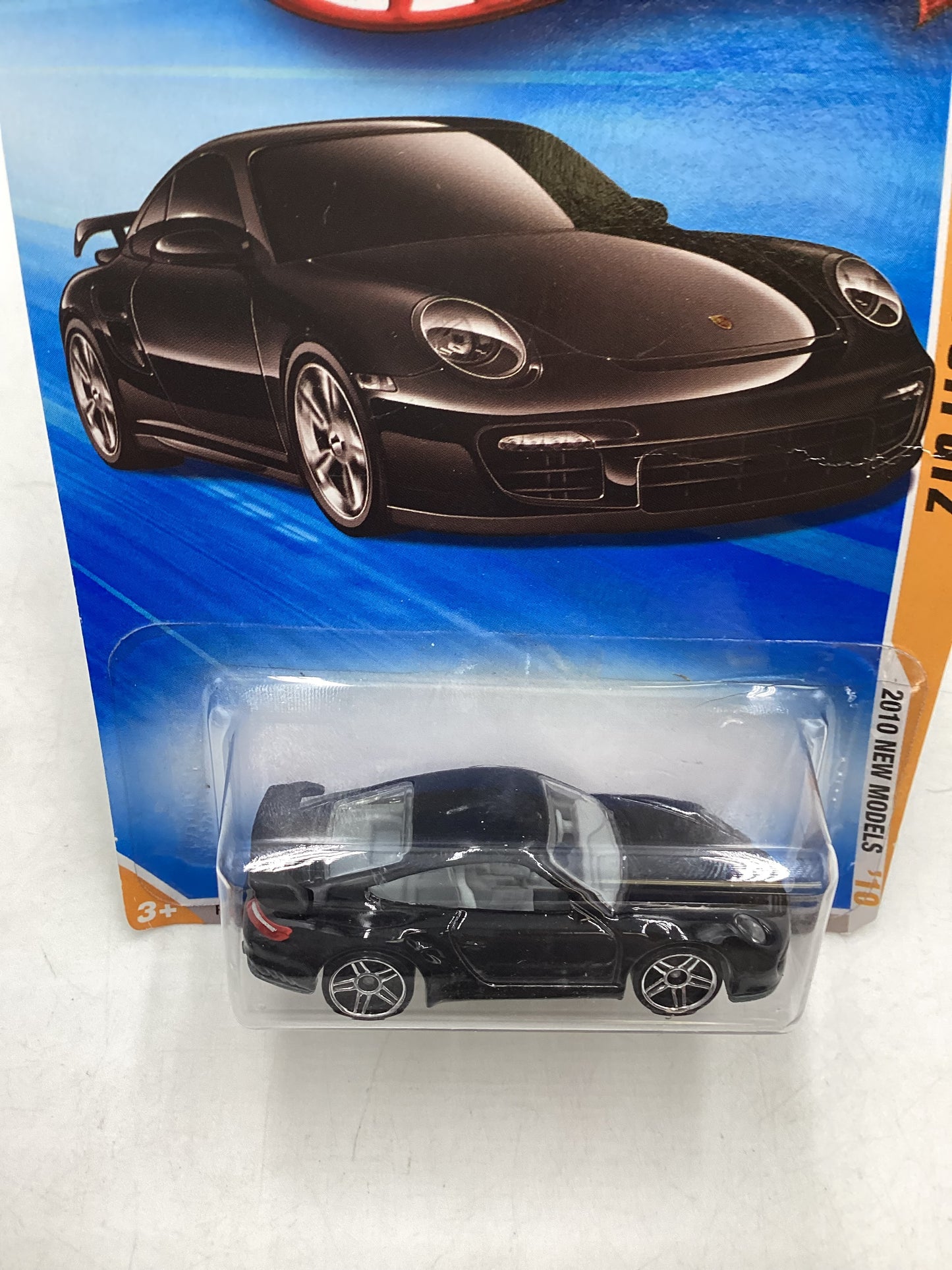 2010 Hot Wheels #014 Black Porsche 911 GT2 *Creased Card*