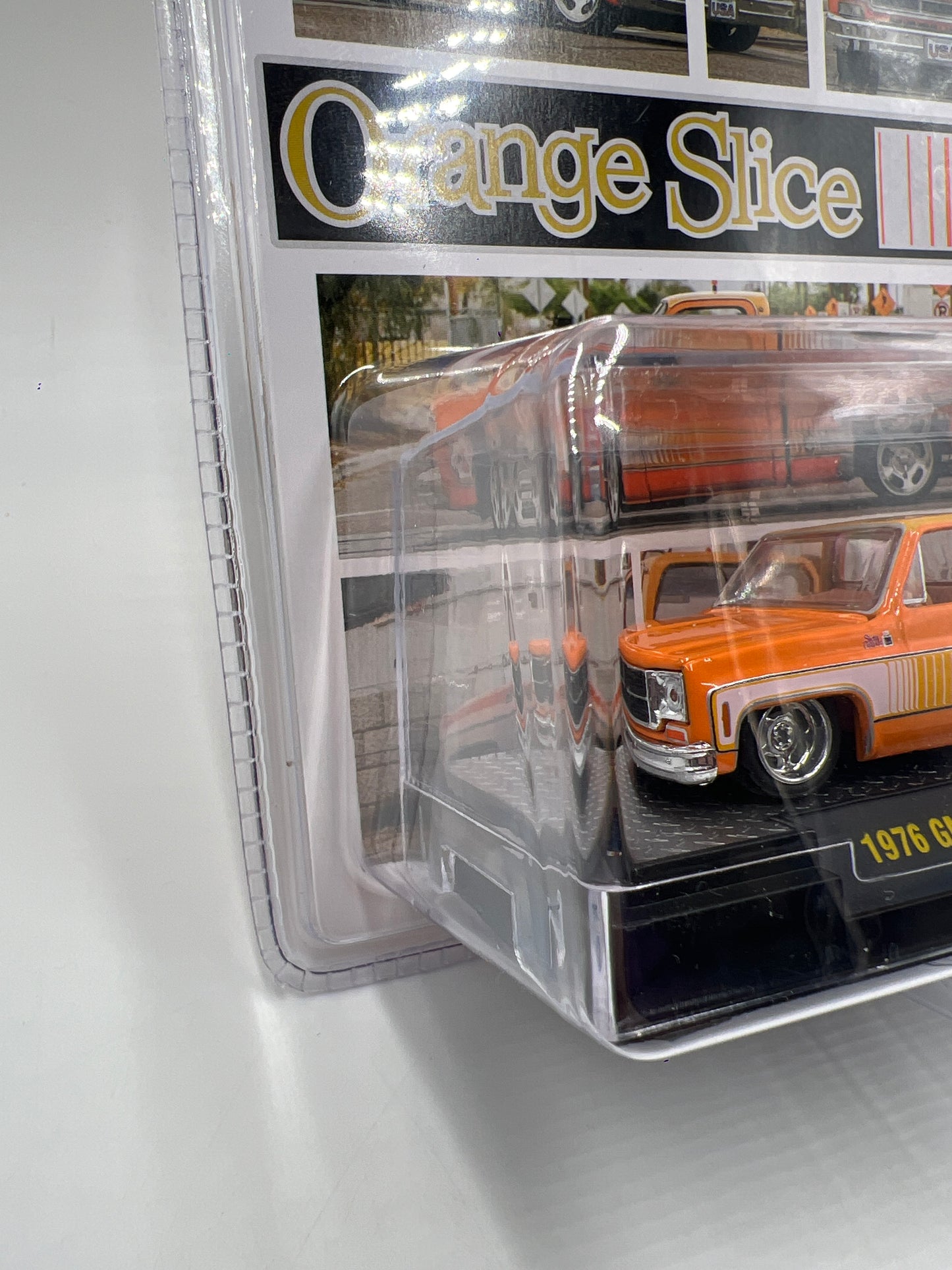 M2 Machines Hobby Exclusive Orange Slice 1976 GMC Sierra Grande 15 HS61 201D