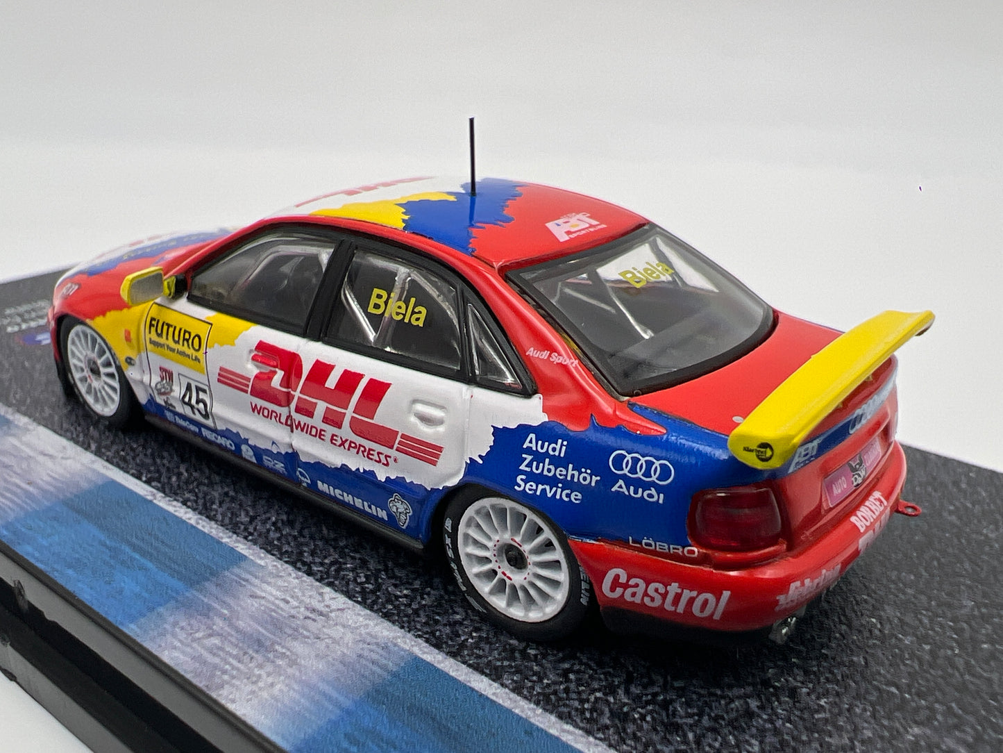 Tarmac Works x Hobby64 Audi A4 Quattro DHL Super Tourenwagen Cup 1998