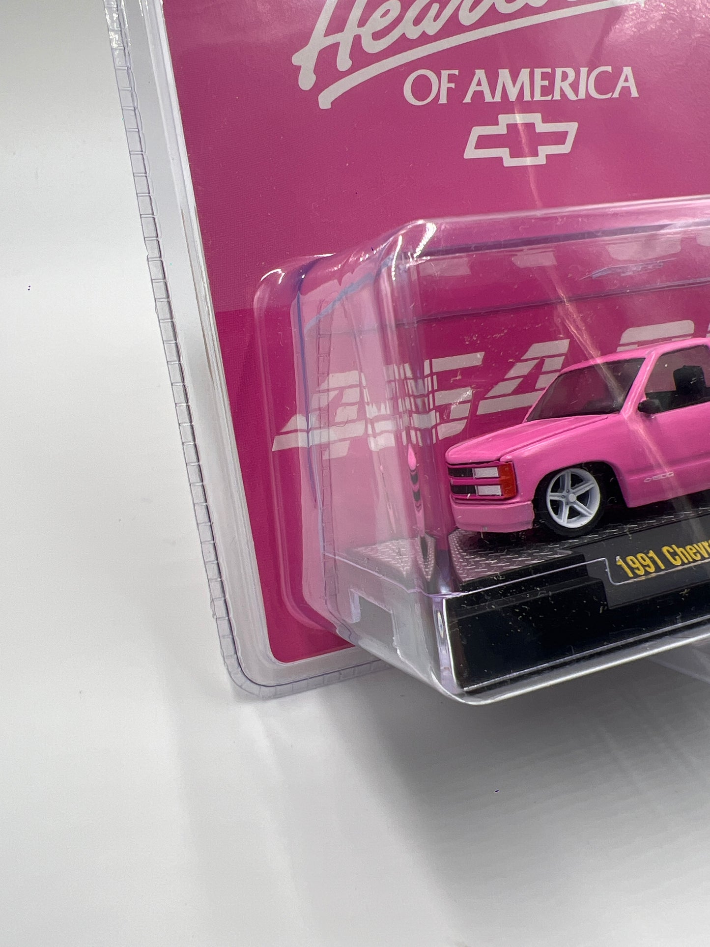 M2 Machines Mijo Exclusives The Heartbeat Of America 1991 Chevrolet C1500 SS 454 Pink MJS76