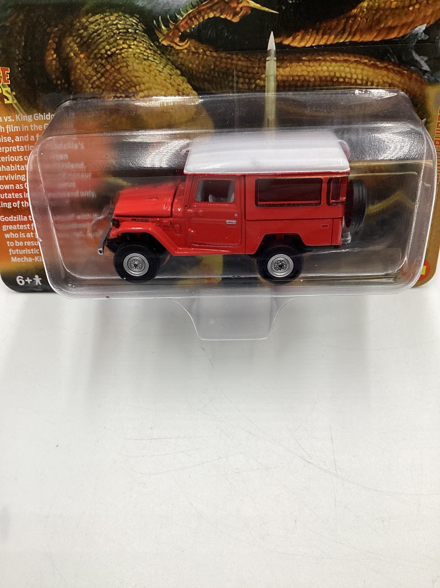 Johnny Lightning Pop Culture Godzilla Release 2 #3 1080 Toyota Land Cruiser Red