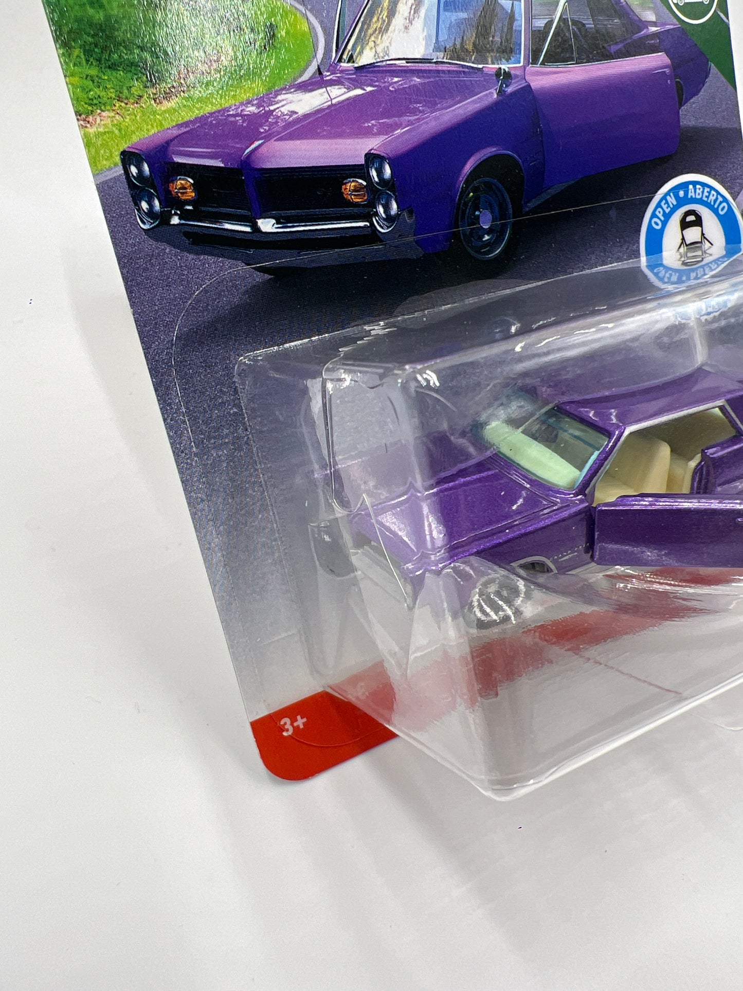 Matchbox Moving Parts MBX Road Trip 64 Pontiac Grand Prix Purple Cracked Blister 169G