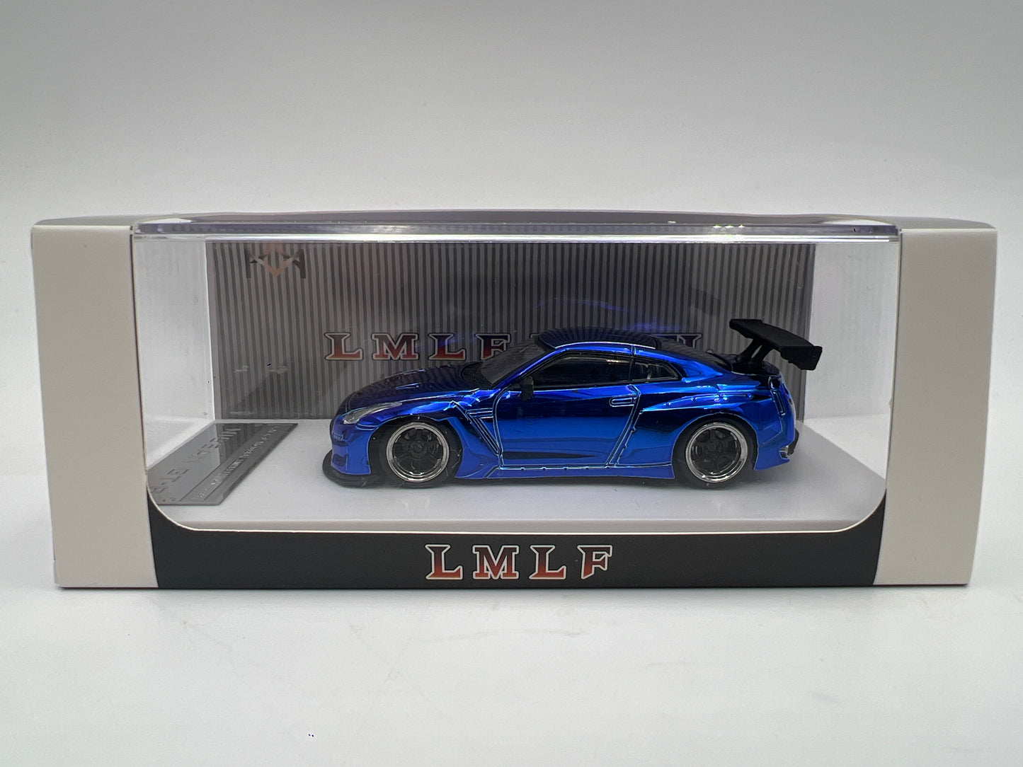 LMLF Models 1/64 #143/499 Nissan GT-R Skyline Chrome Blue Cracked Case