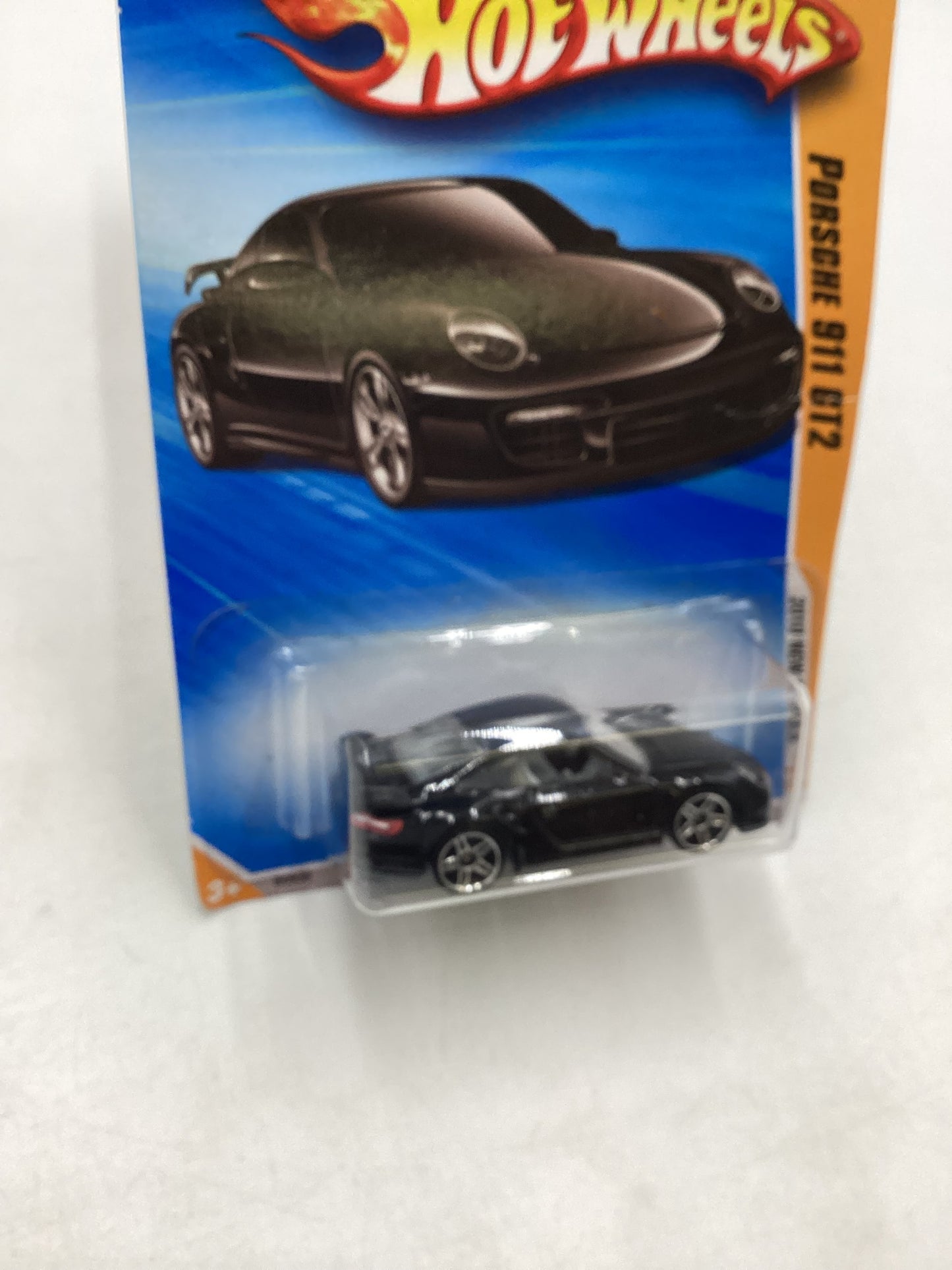 2010 Hot Wheels #014 Black Porsche 911 GT2 *Creased Card*