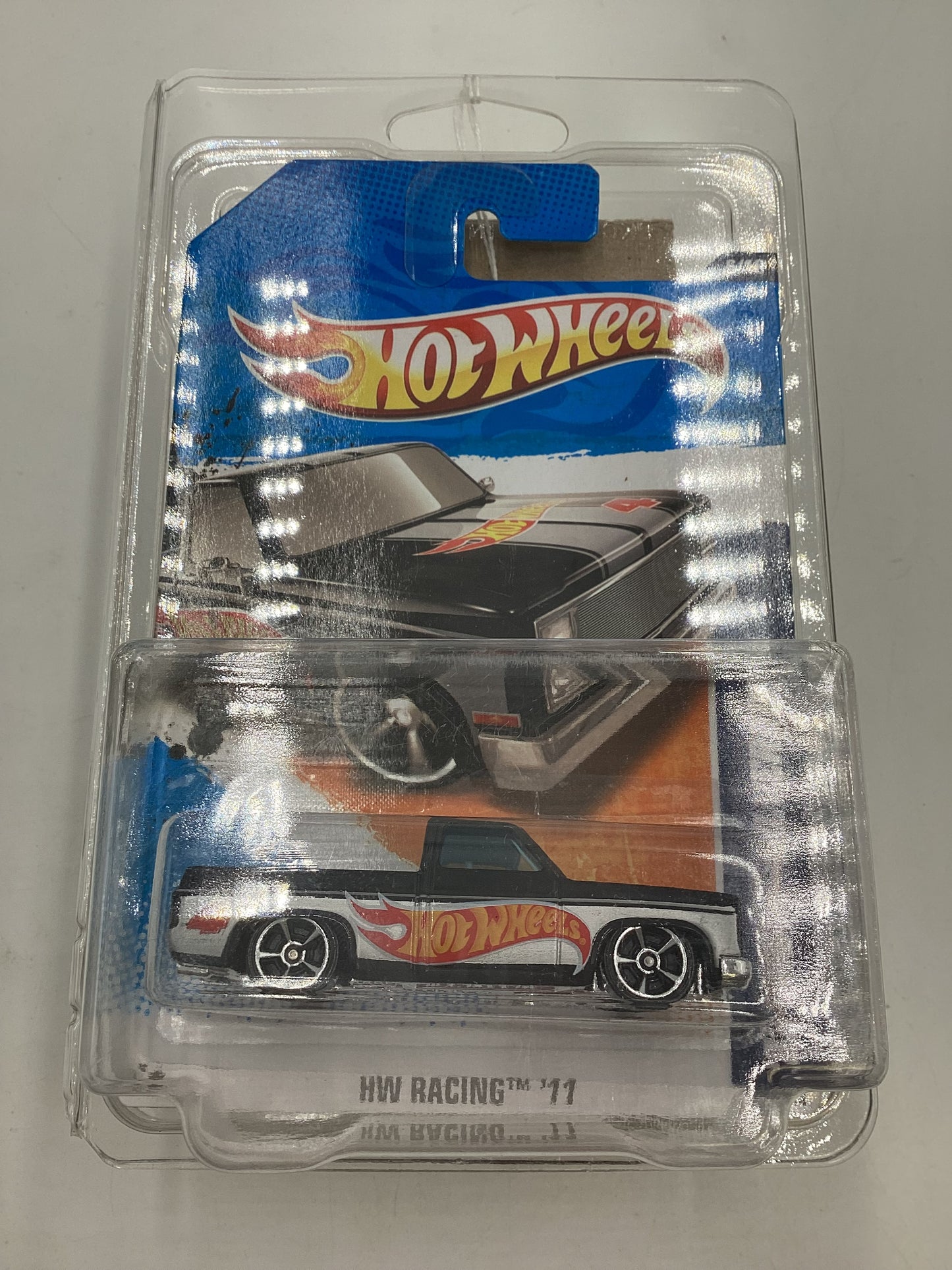 2011 Hot Wheels #156 Walmart Exclusive Black 83 Chevy Silverado with protector