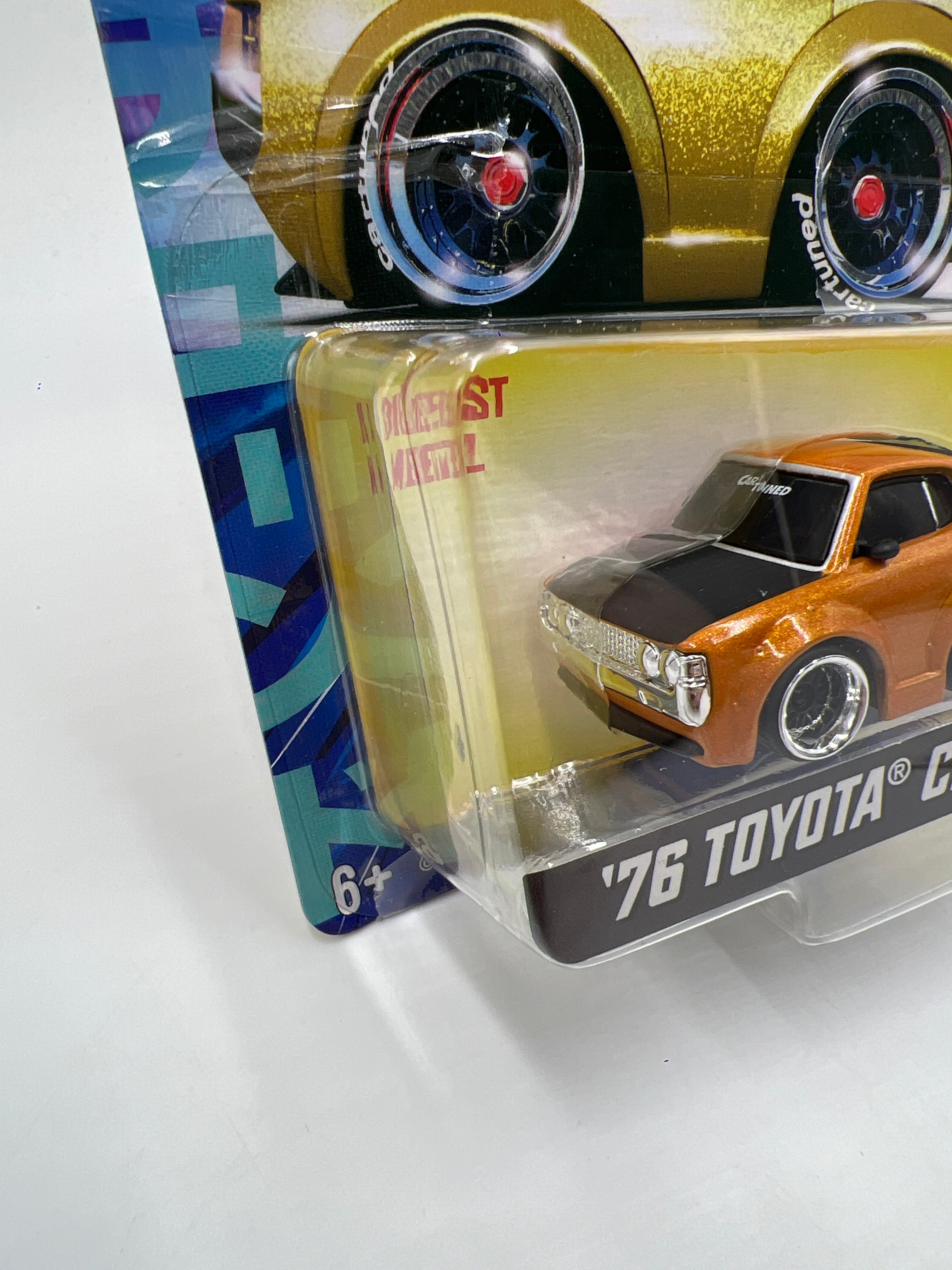2025 MGA Car Tuned JDM Series 2 #8 76 Toyota Celica Orange 178Q