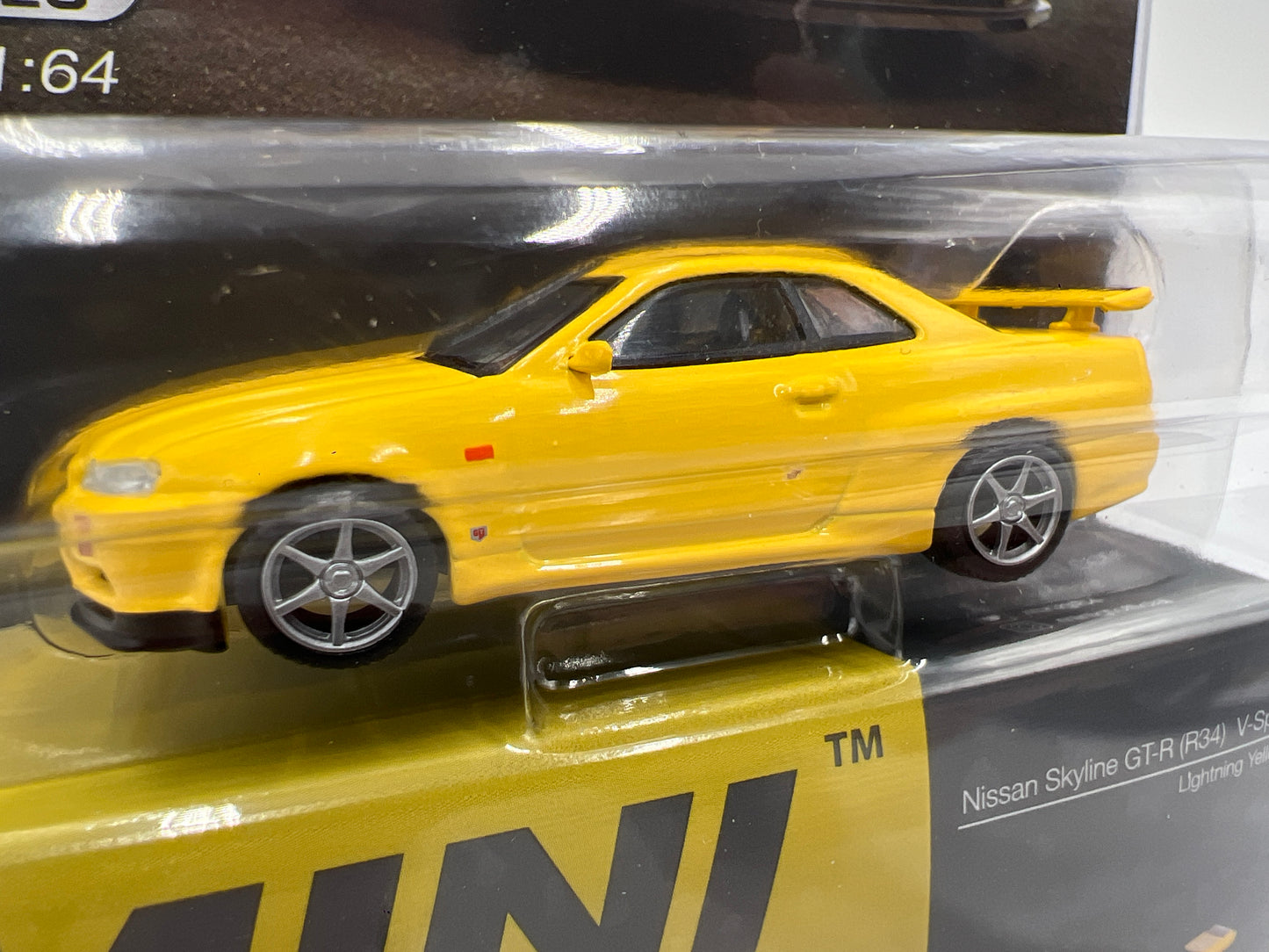 Mini GT Mijo Exclusives #762 Nissan Skyline GT-R R34 V-Spec Yellow