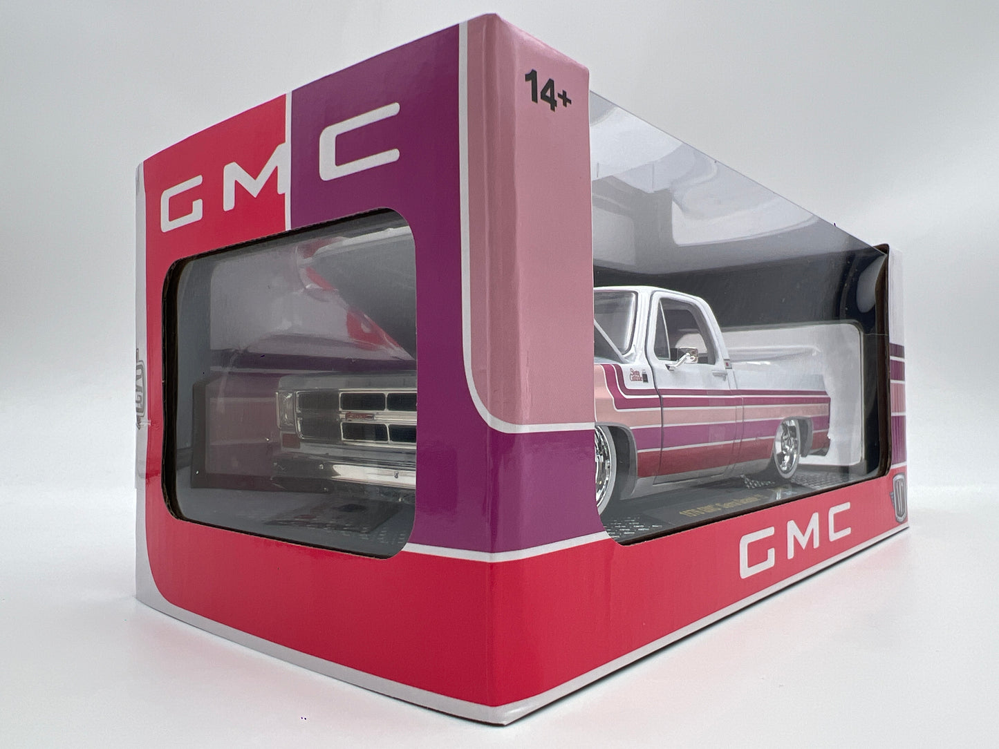 M2 Machines 1/24 Scale R140 1976 GMC Sierra Grande 15 White/Pink