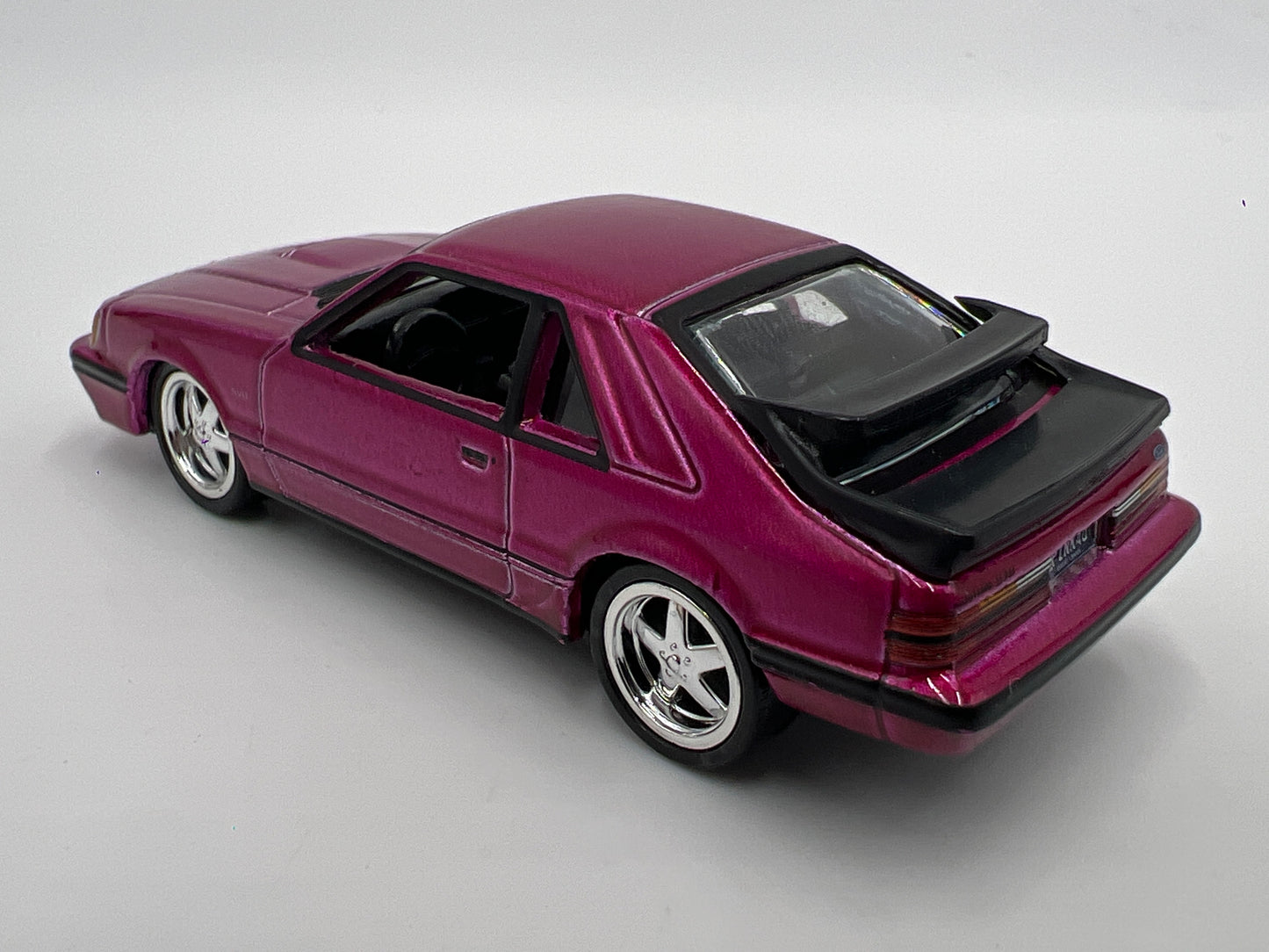 Auto World 1/64 Target Exclusive 1985 Ford Mustang SVO Pink Loose