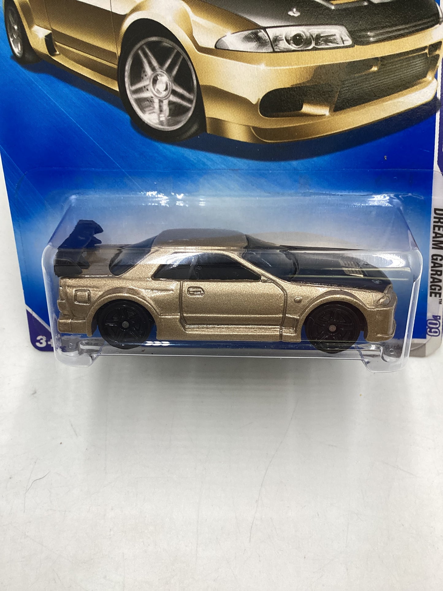 2009 Hot Wheels #156 Nissan Skyline GT-R R32 Gold  W/Protector