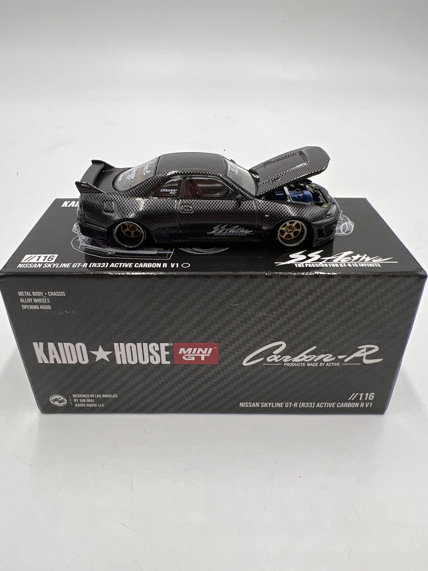 Mini GT Kaido House #116 Nissan Skyline GT-R R33 Active Carbon R V1