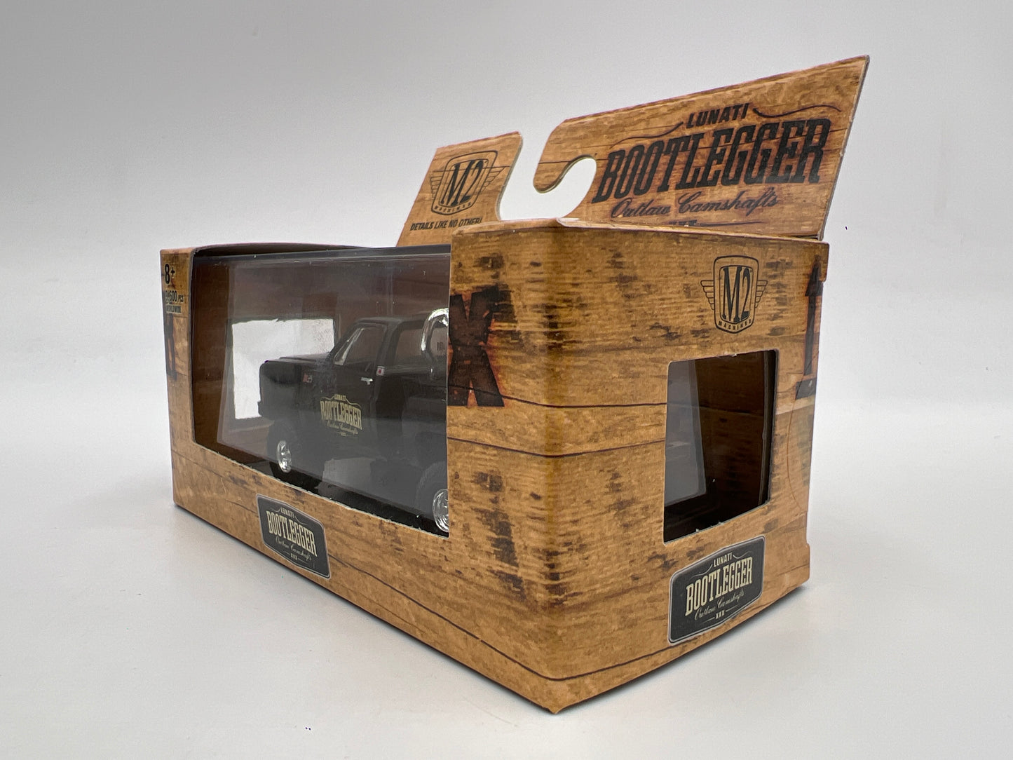 M2 Machines Lunati Bootlegger 1976 GMC High Sierra 15 4x4 Black S48