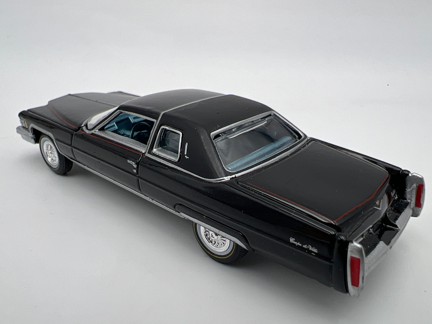 Auto World 1/64 Land Yachts 1976 Cadillac Coupe DeVille Black Loose