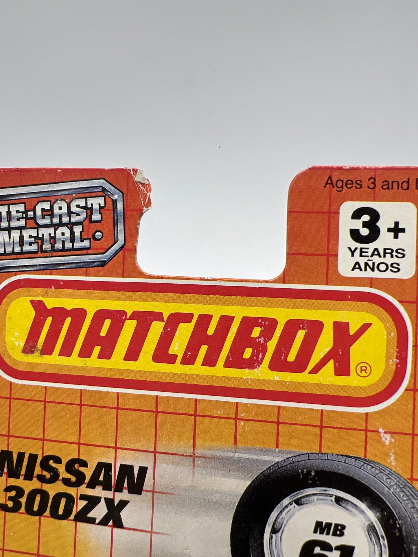 1990 Matchbox Motors MB #61 300ZX Yellow W/Protector Bad Card SR