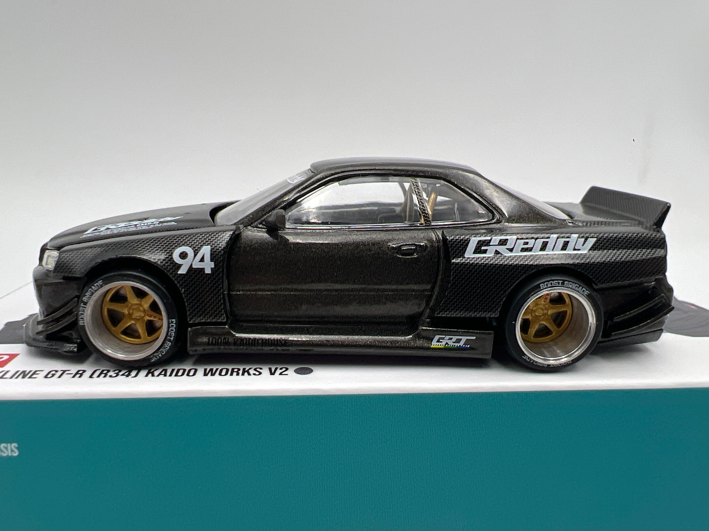 Mini GT Kaido House #222 Nissan Skyline GT-R R34 Kaido Works Carbon V2 GReddy