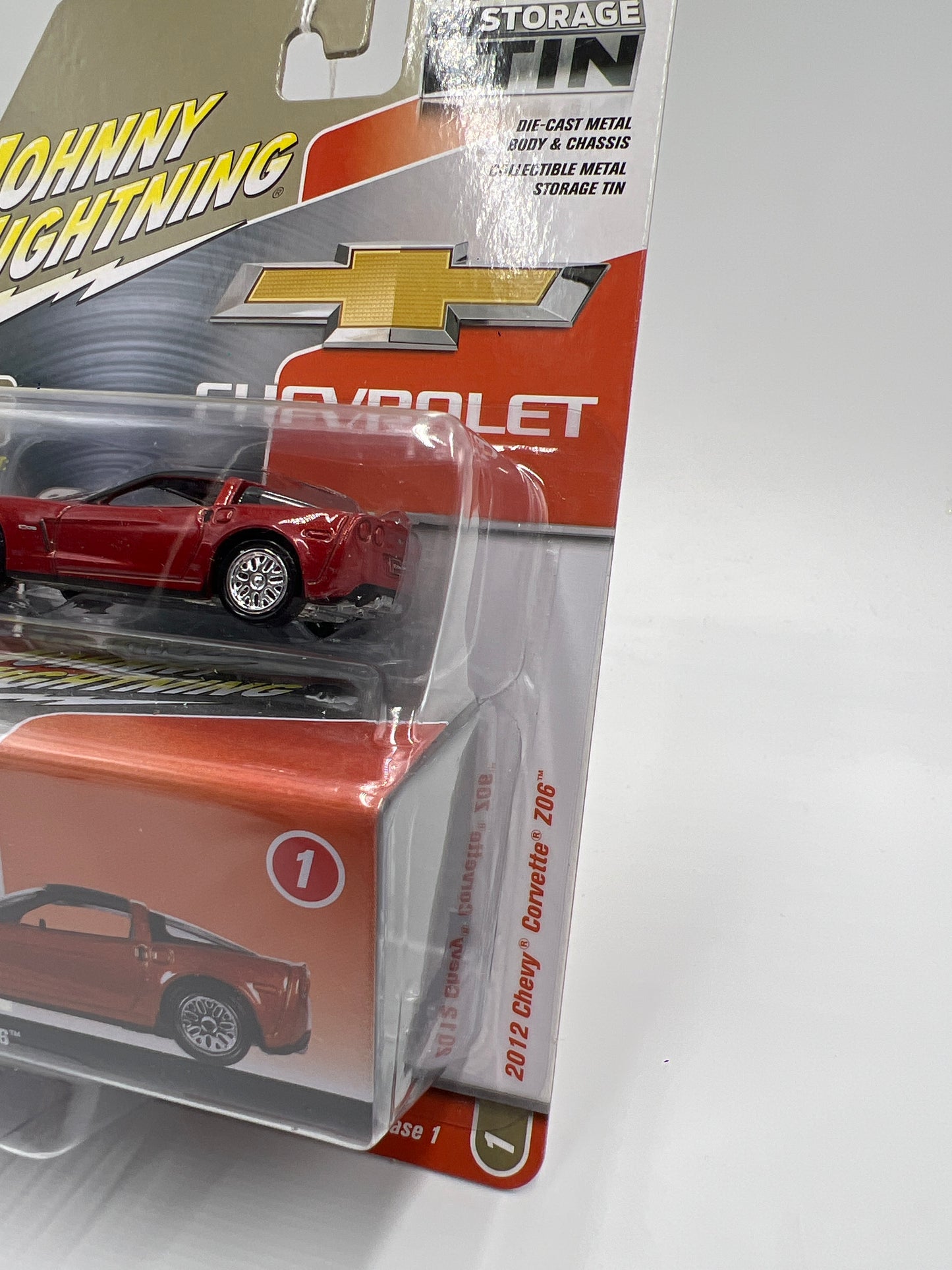 Johnny Lightning Storage Tin Release 1 Version B #1 2012 Chevy Corvette Z06 Orange 228F