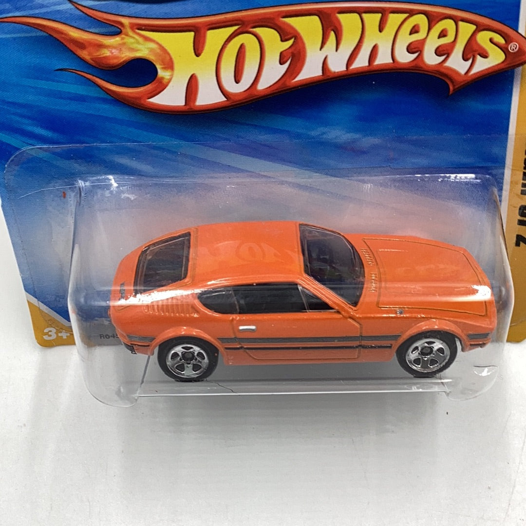 2010 Hot Wheels #46 Volkswagen SP2 orange international short card 240D