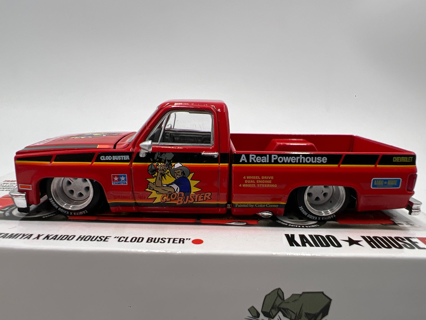 Mini GT x Kaido House #130 Chevrolet Silverado Tamiya x Kaido House Clod Buster Orange