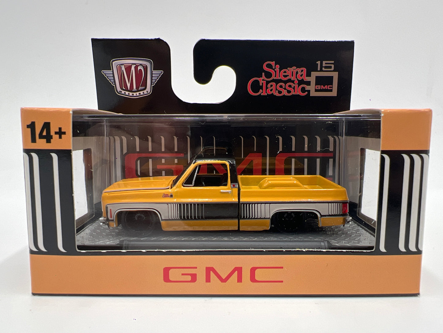 M2 Machines R106 1976 GMC Sierra Grande 15 SS02 Orange