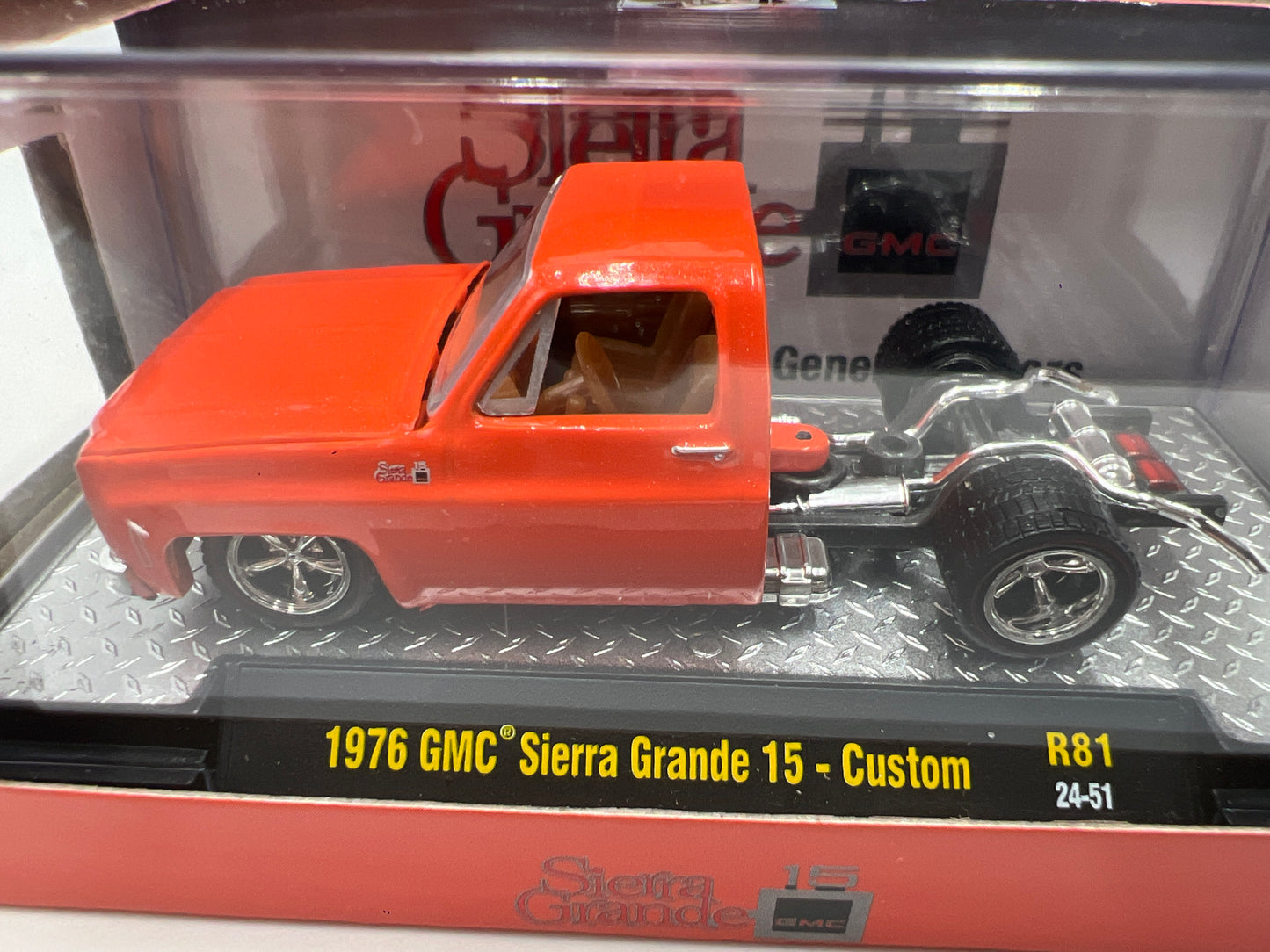 2024 M2 Machines 1976 GMC Sierra Grande 15 Orange Custom R81