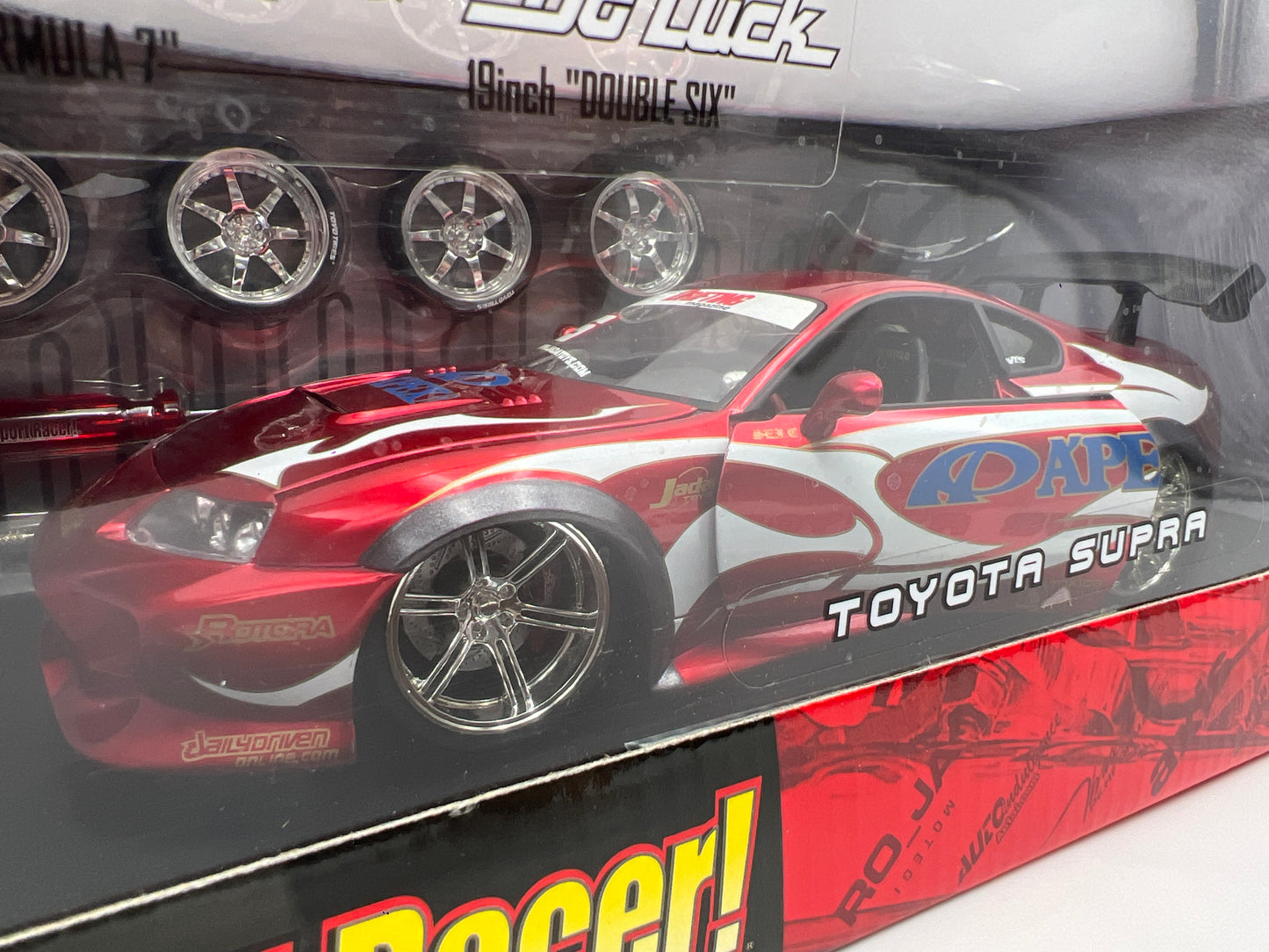 Jada 1:18 Scale Import Racer Toyota Supra Red W/Extra Wheels & Hood