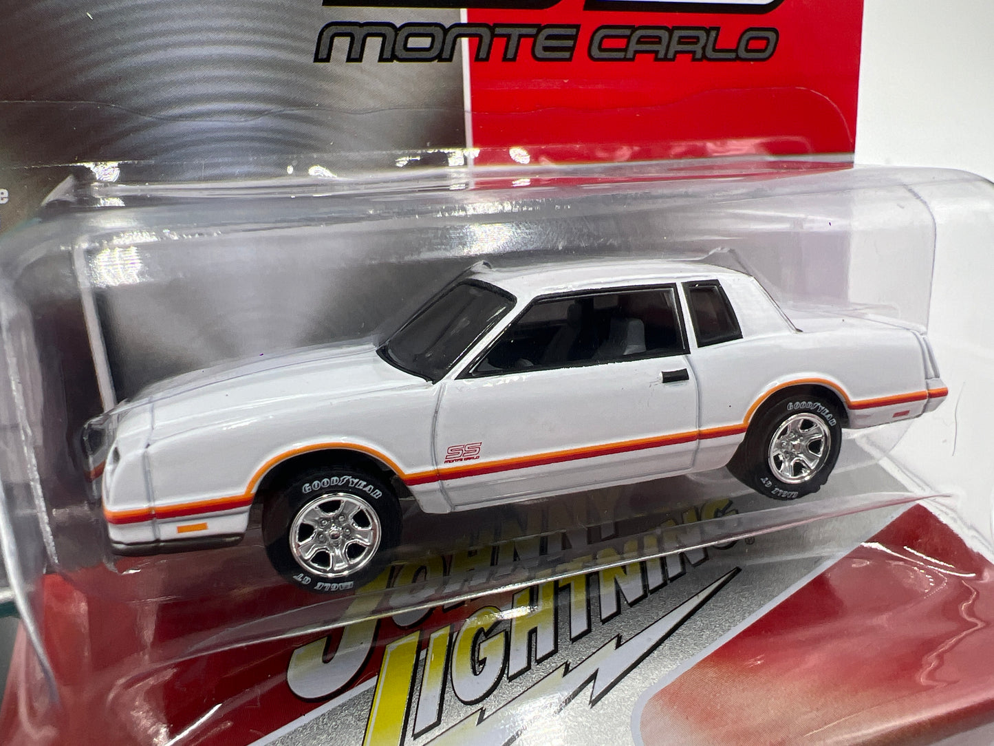 Johnny Lightning Storage Tin Release 1 Version A 1987 Chevy Monte Carlo SS White 1/2500