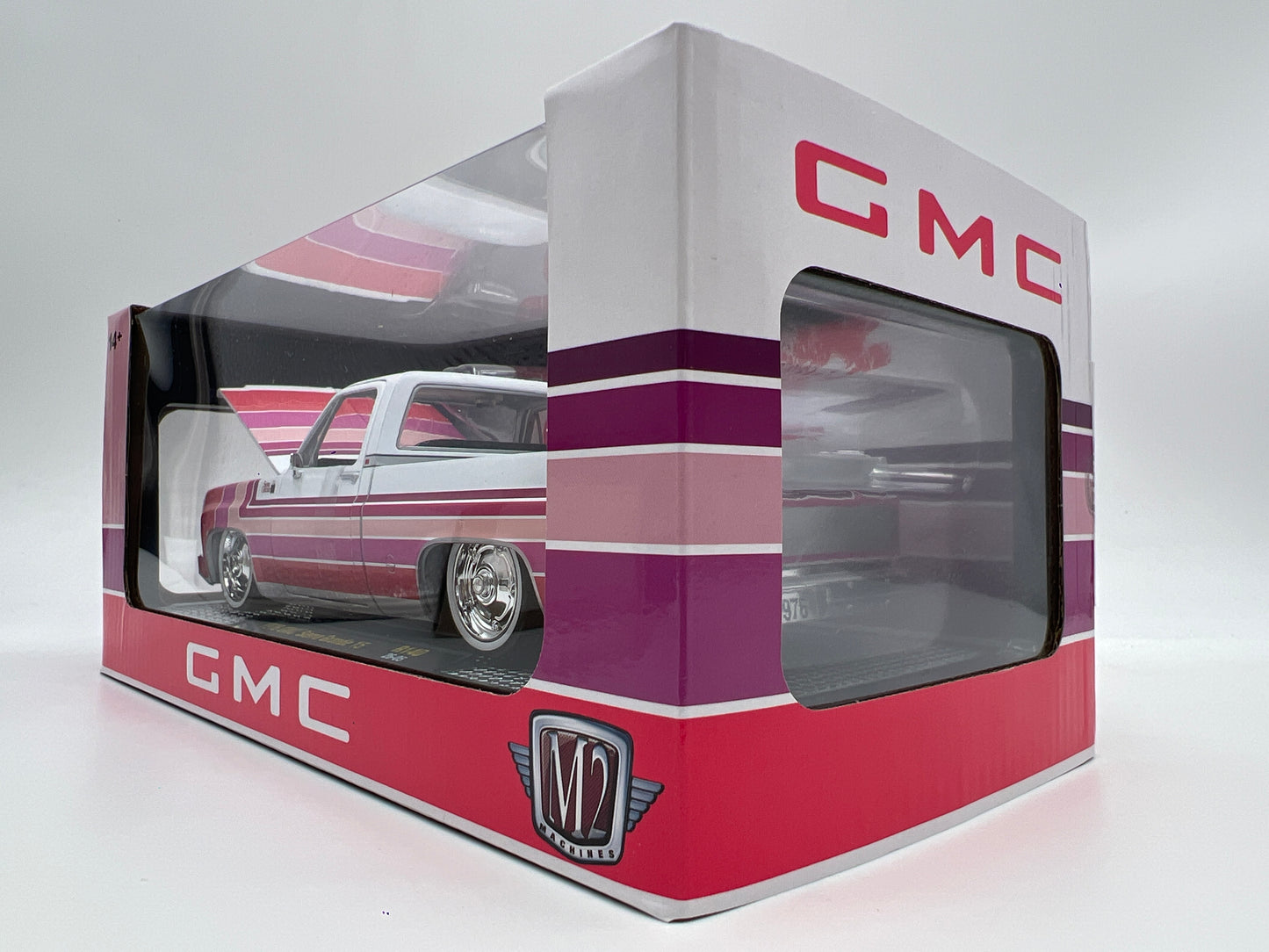 M2 Machines 1/24 Scale R140 1976 GMC Sierra Grande 15 White/Pink