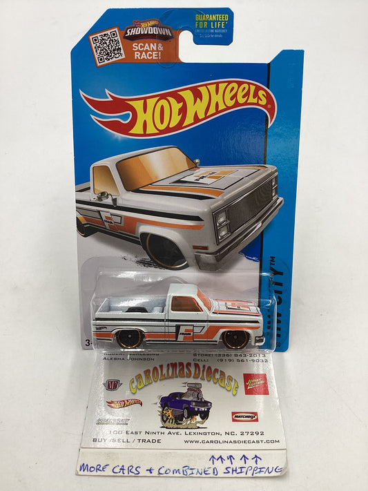 2015 Hot Wheels #016 Toys R Us Exclusive 83 Chevy Silverado with protector