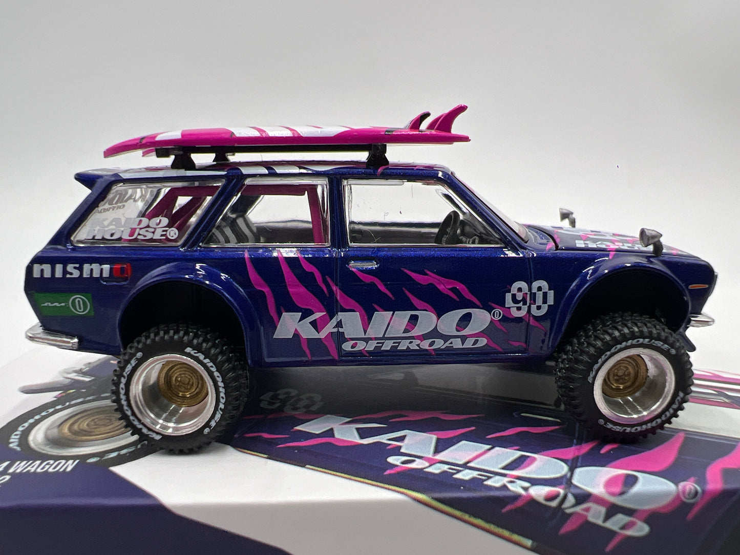Mini GT x Kaido House #149 Datsun 510 4x4 Wagon Kaido Off-road V2 Purple W/Surfboards