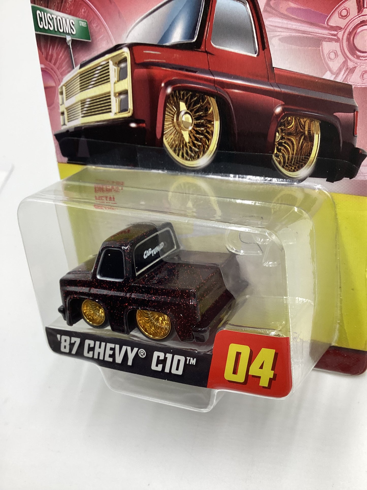 2024 Car Tuned Series 1 #04 87 Chevy C10 Black / Red Metal Flake Walgreens Exclusive with protector