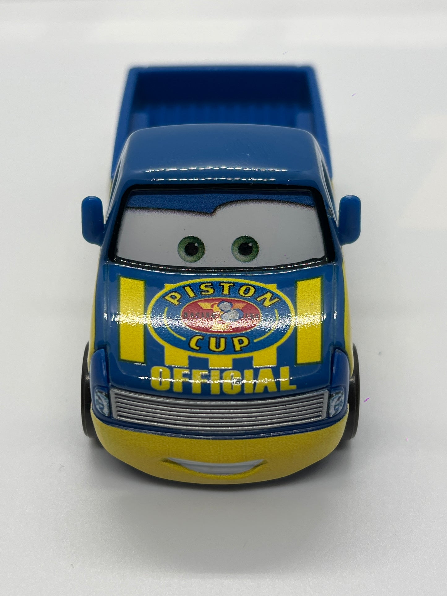 Disney Pixar Cars Piston Cup Race Tom Truck Blue/Yellow Loose