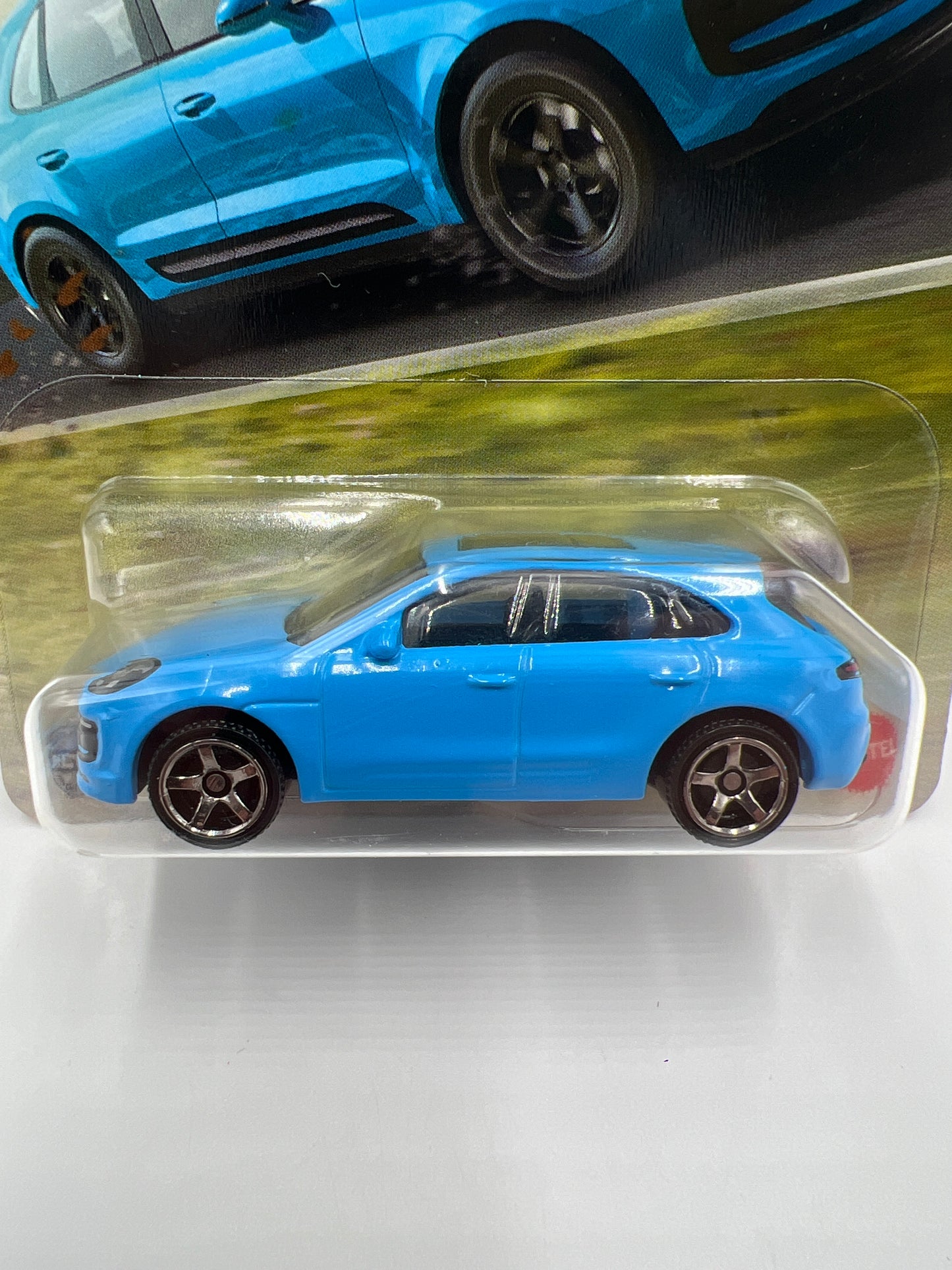 Matchbox #64 Porsche Macan S Light Blue 213L