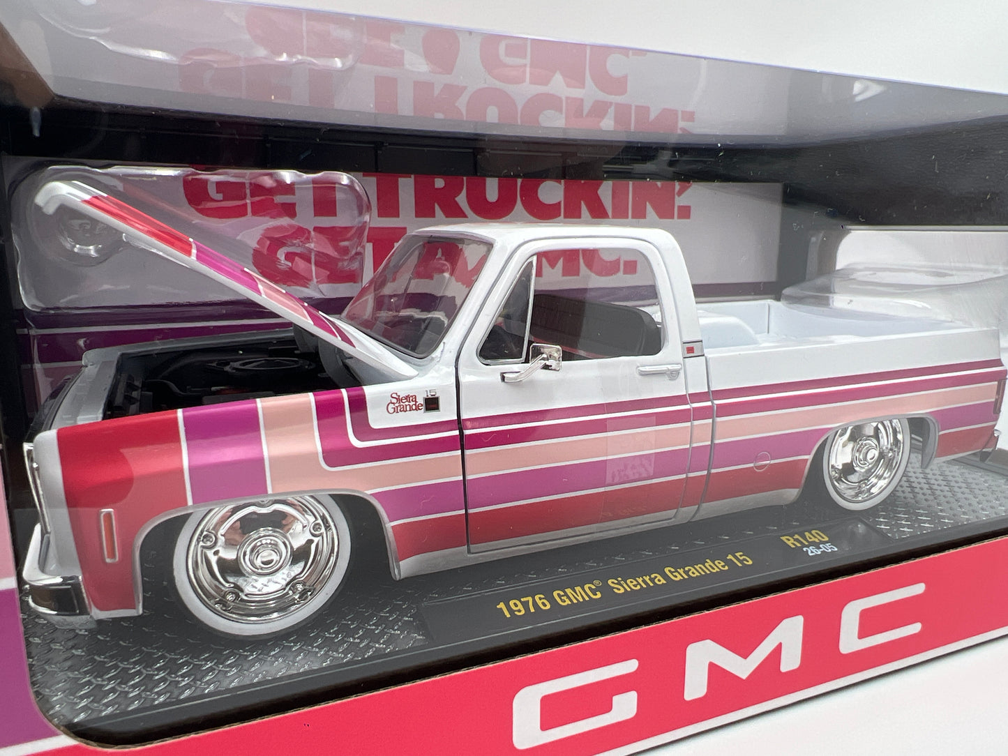 M2 Machines 1/24 Scale R140 1976 GMC Sierra Grande 15 White/Pink