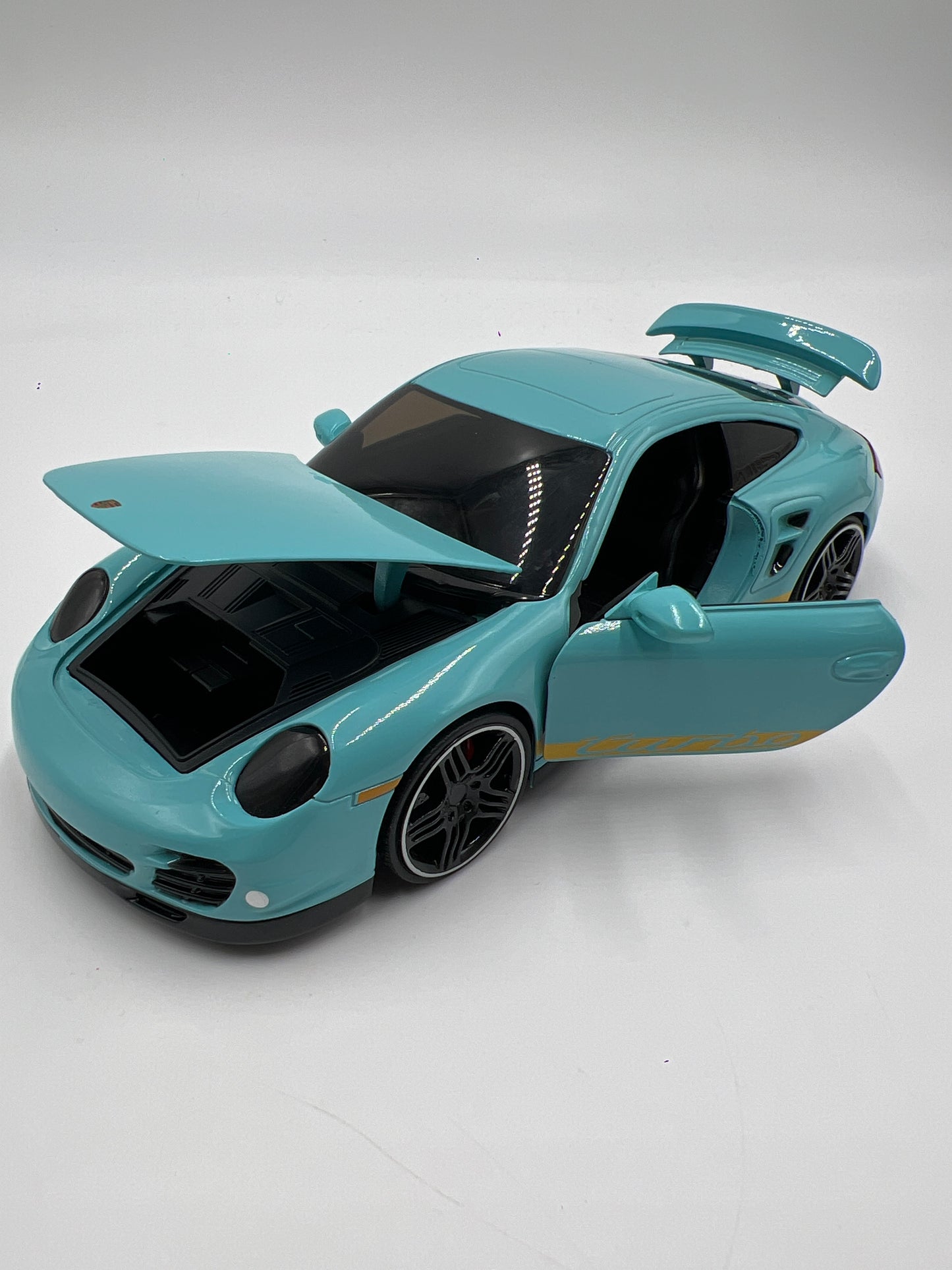 Jada Toys 1/24 Scale Pink Slips 2007 Porsche 911 Turbo Light Blue Loose