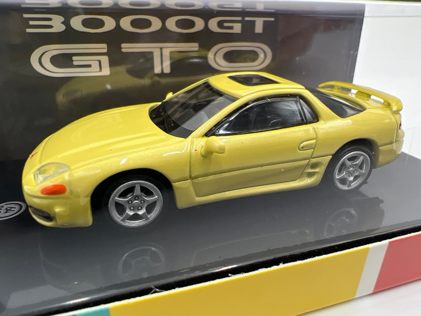 Para64 1:64 Scale Diecast Mitsubishi Motors Mitsubishi 3000GT GTO Martinique Yellow