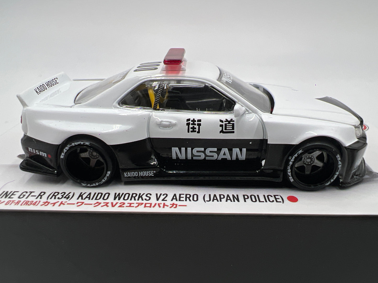 Mini GT x Kaido House #120 Nissan Skyline GT-R R34 Kaido Works V2 Aero Japan Police