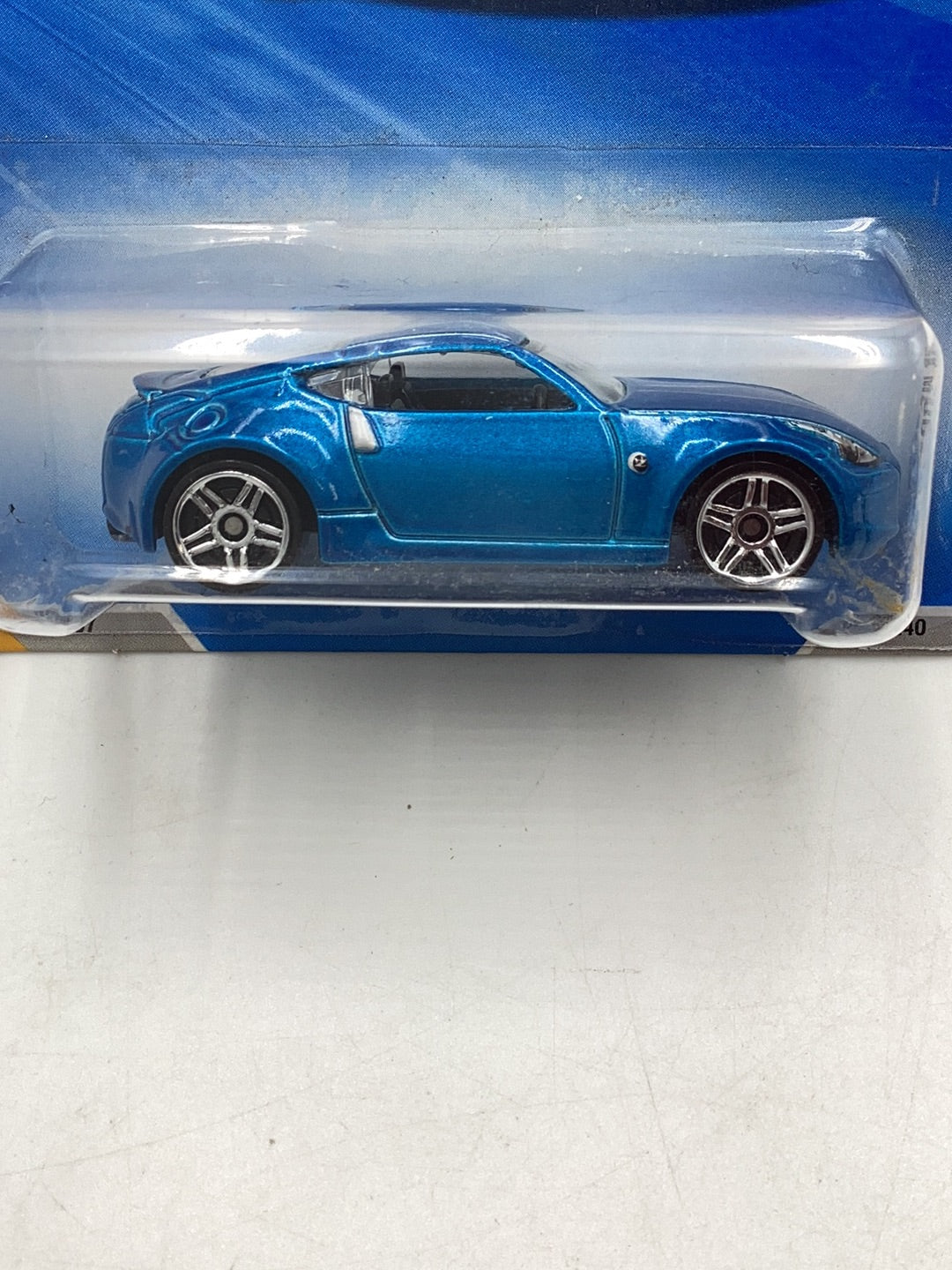 2010 Hot wheels #37 Nissan 370Z blue 97B