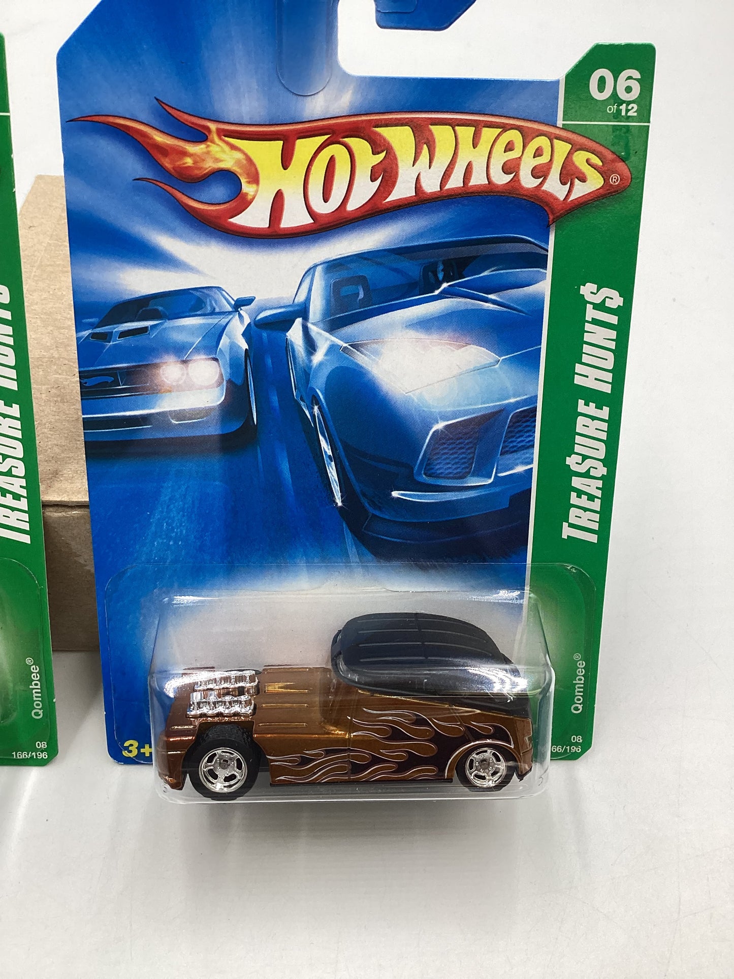 2008 Hot Wheels Super Treasure Hunt + Treasure Hunt Qombee Gold #166 with protector