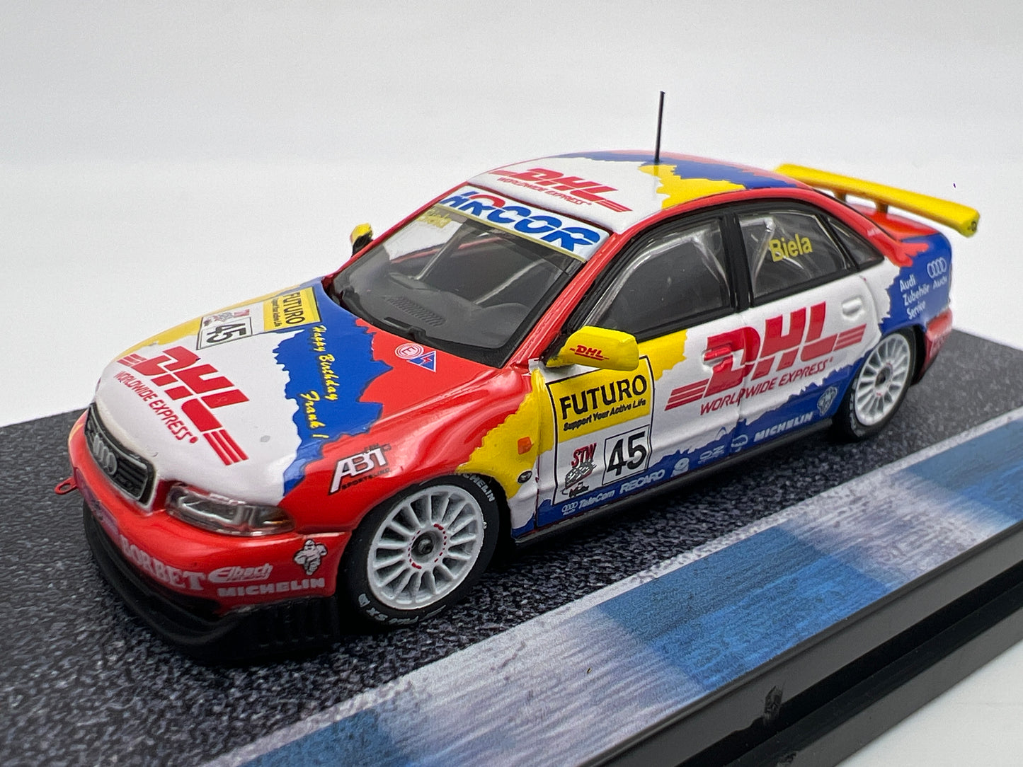 Tarmac Works x Hobby64 Audi A4 Quattro DHL Super Tourenwagen Cup 1998