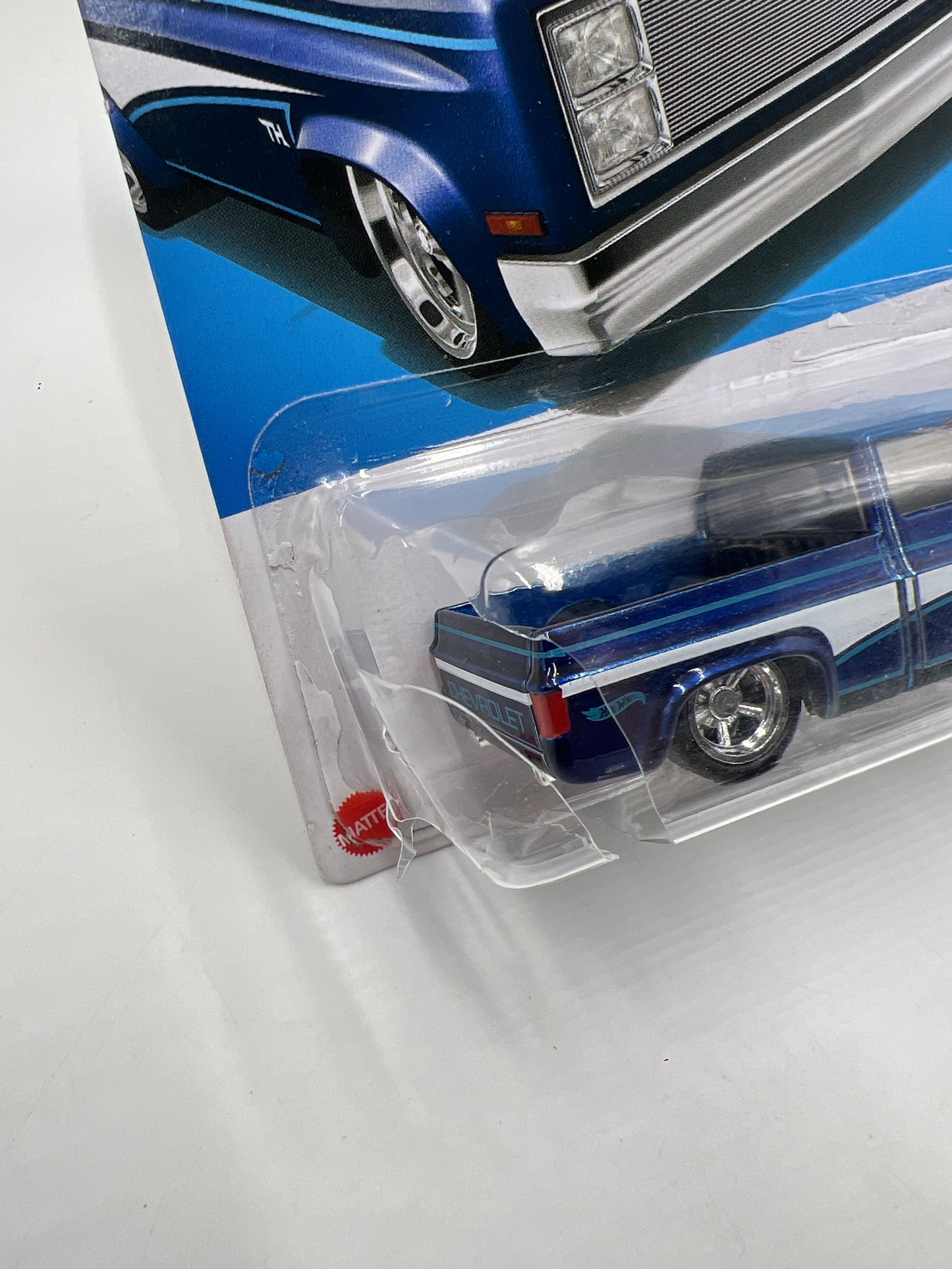 2024 Hot Wheels Super Treasure Hunt #249 83 Chevy Silverado Blue W/Protector Bad Card/Blister