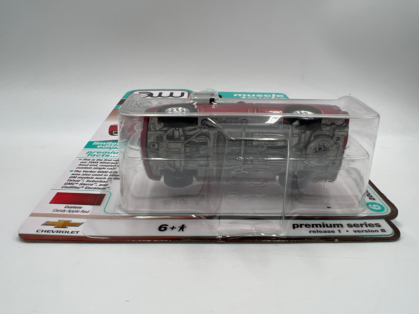 2025 Auto World Muscle Trucks Release 1 Version B 2005 Chevy Silverado SS Custom Red Cateye 185D